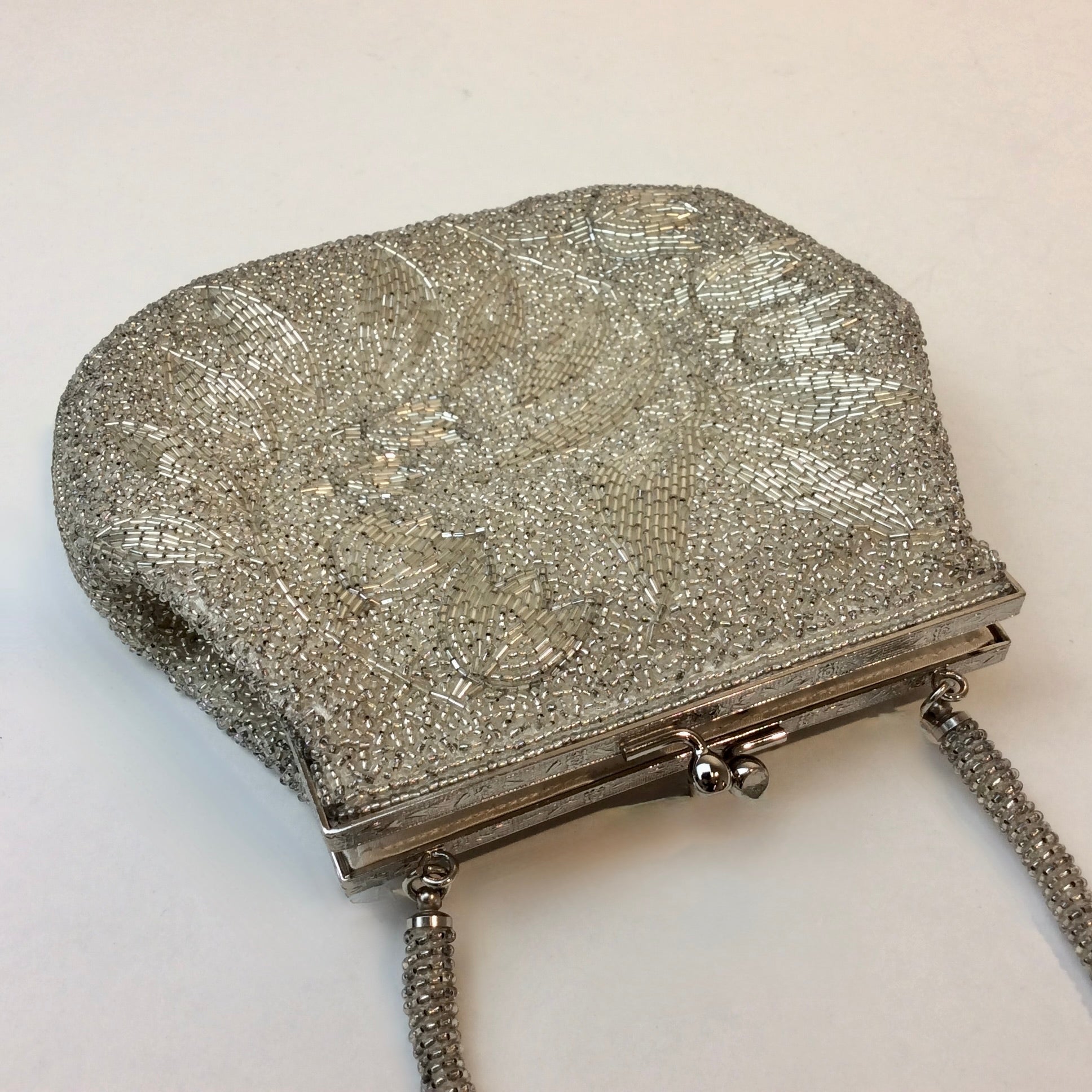 Boheme Vintage 1950s silver beaded evening handbag with floral beadwork, kiss‑lock closure, and beaded strap.