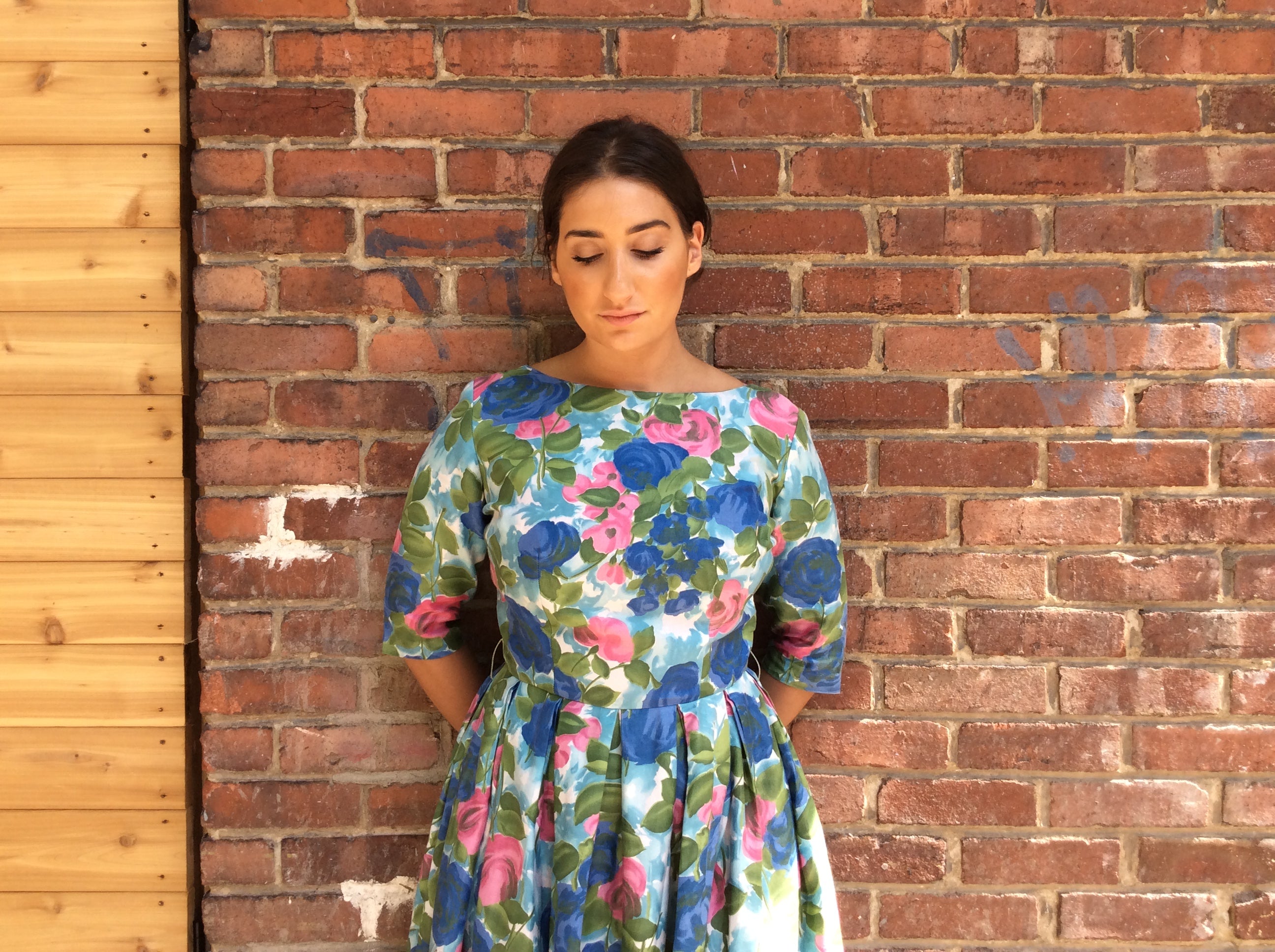 Boheme Vintage 1950s Leo-Danal Montreal cotton dress with painterly print, fitted bodice, and box pleated skirt.