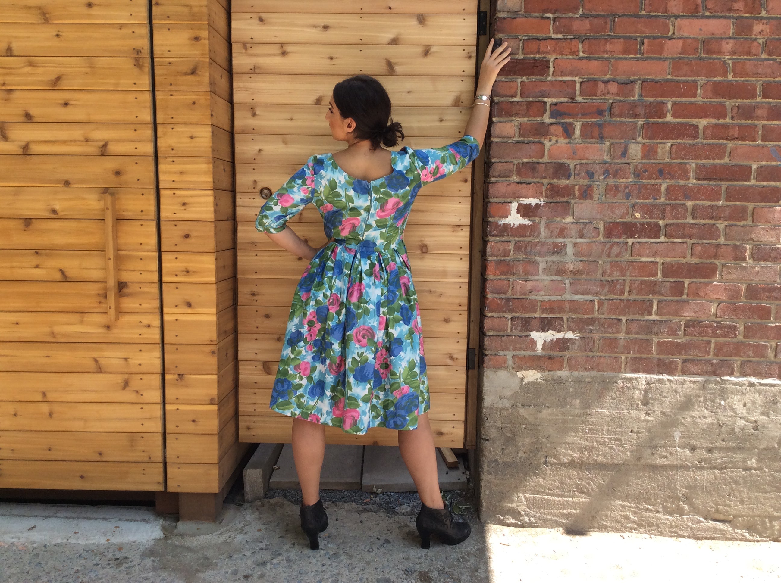 Boheme Vintage 1950s Leo-Danal Montreal cotton dress with painterly print, fitted bodice, and box pleated skirt.