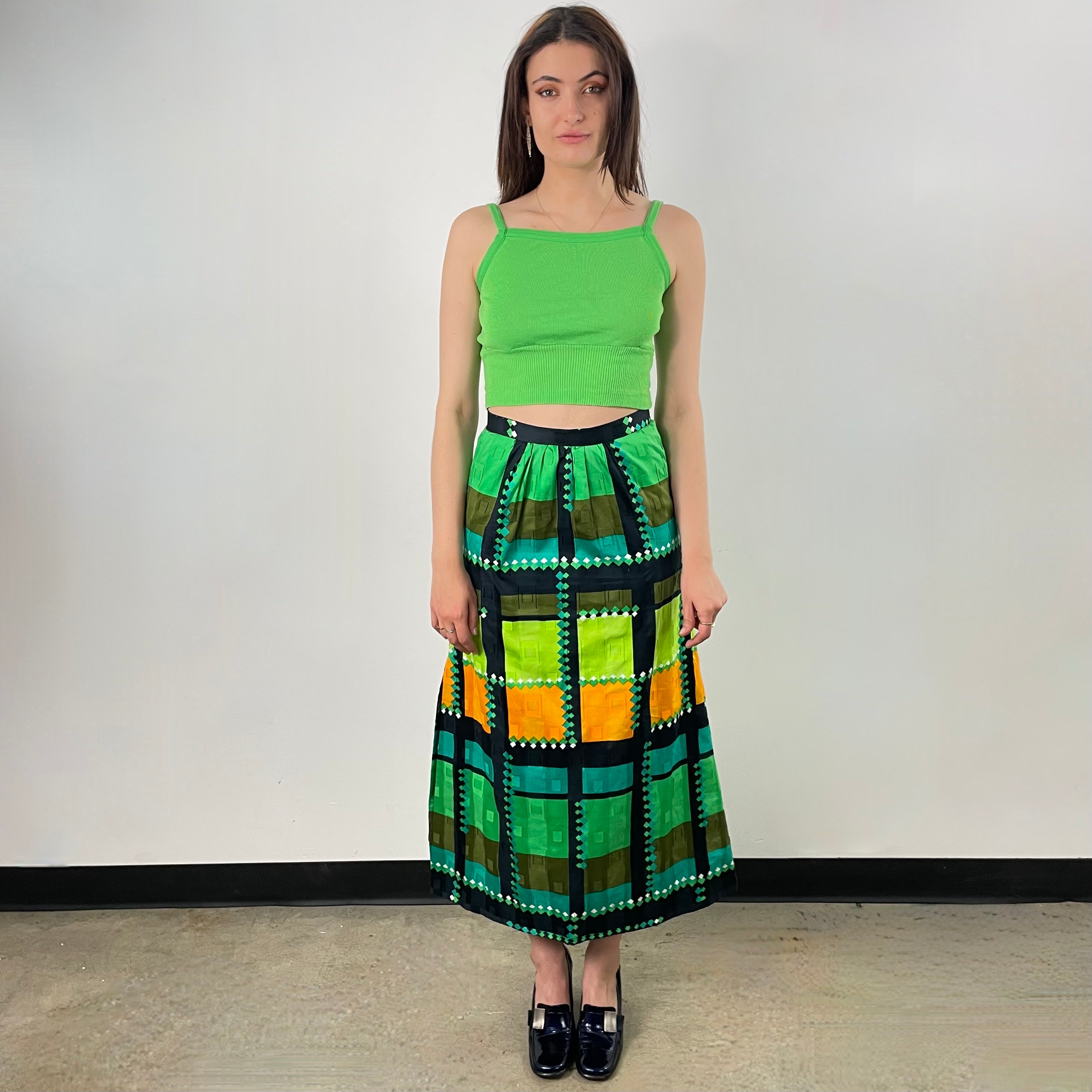 Boheme Vintage 1970s handmade floral cotton A-line midi skirt with gathered waist, side slit, and lightweight cotton lining.