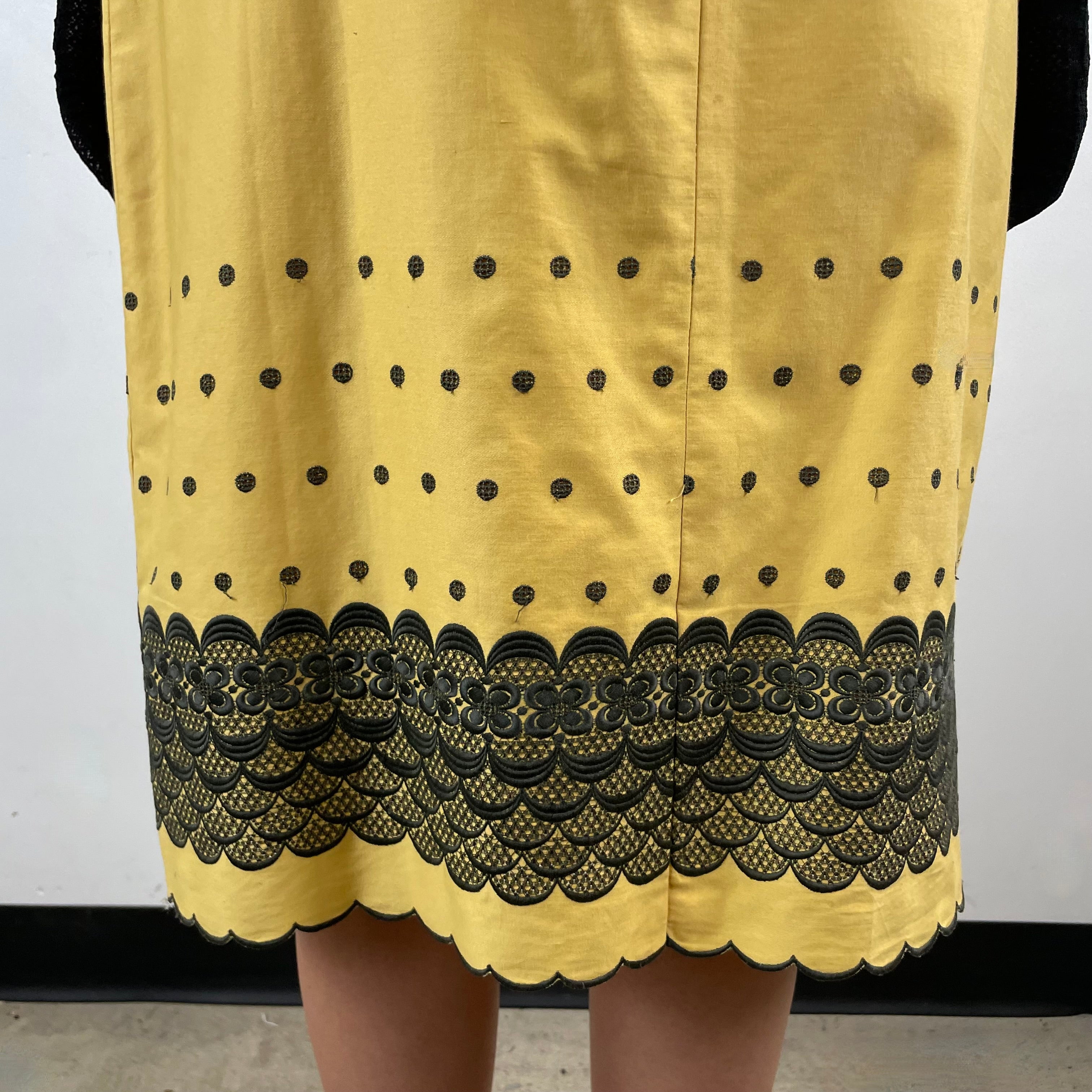 Boheme Vintage 1960s handmade black and gold embroidered cotton skirt and top set with sleeveless top, straight skirt, and scalloped embroidered hems.