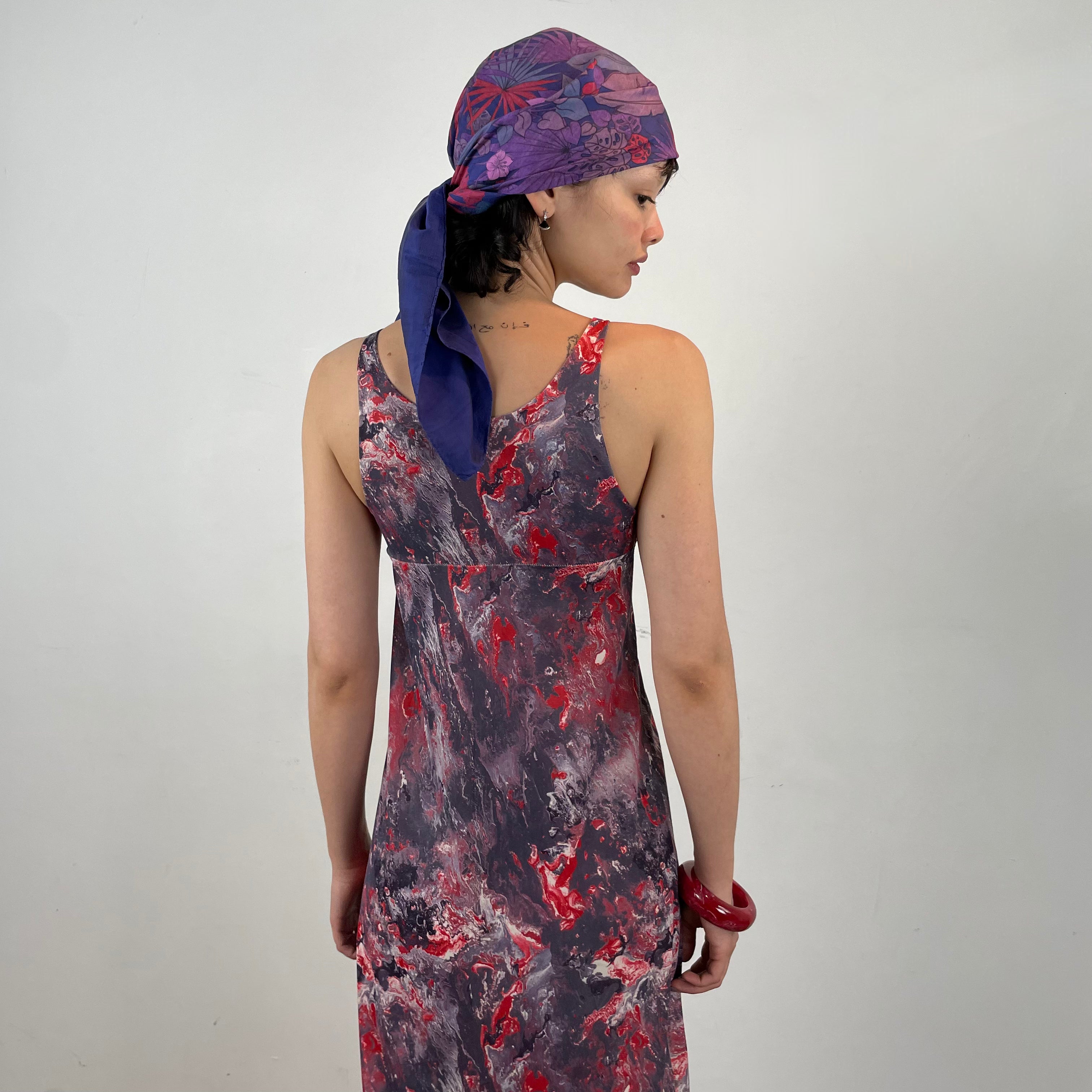 Back view of 1970s Sleeveless Marble Print Maxi Dress
Size Small
Sold at bohemevintage.com
Montréal