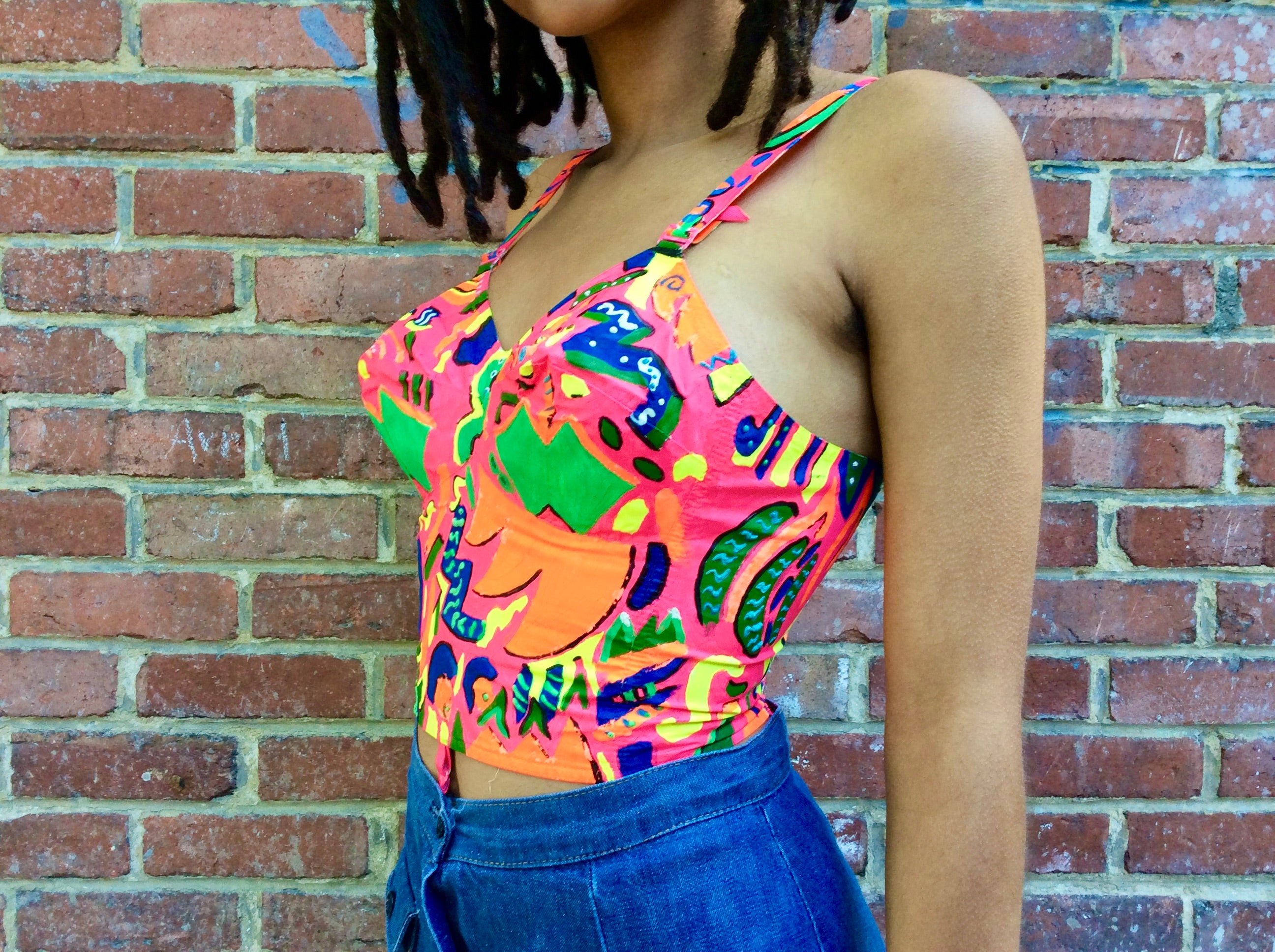 Close up side view of 1960s Upcycled Hand Painted Bustier Top
size Small, sold at bohemevintage.com
Montréal