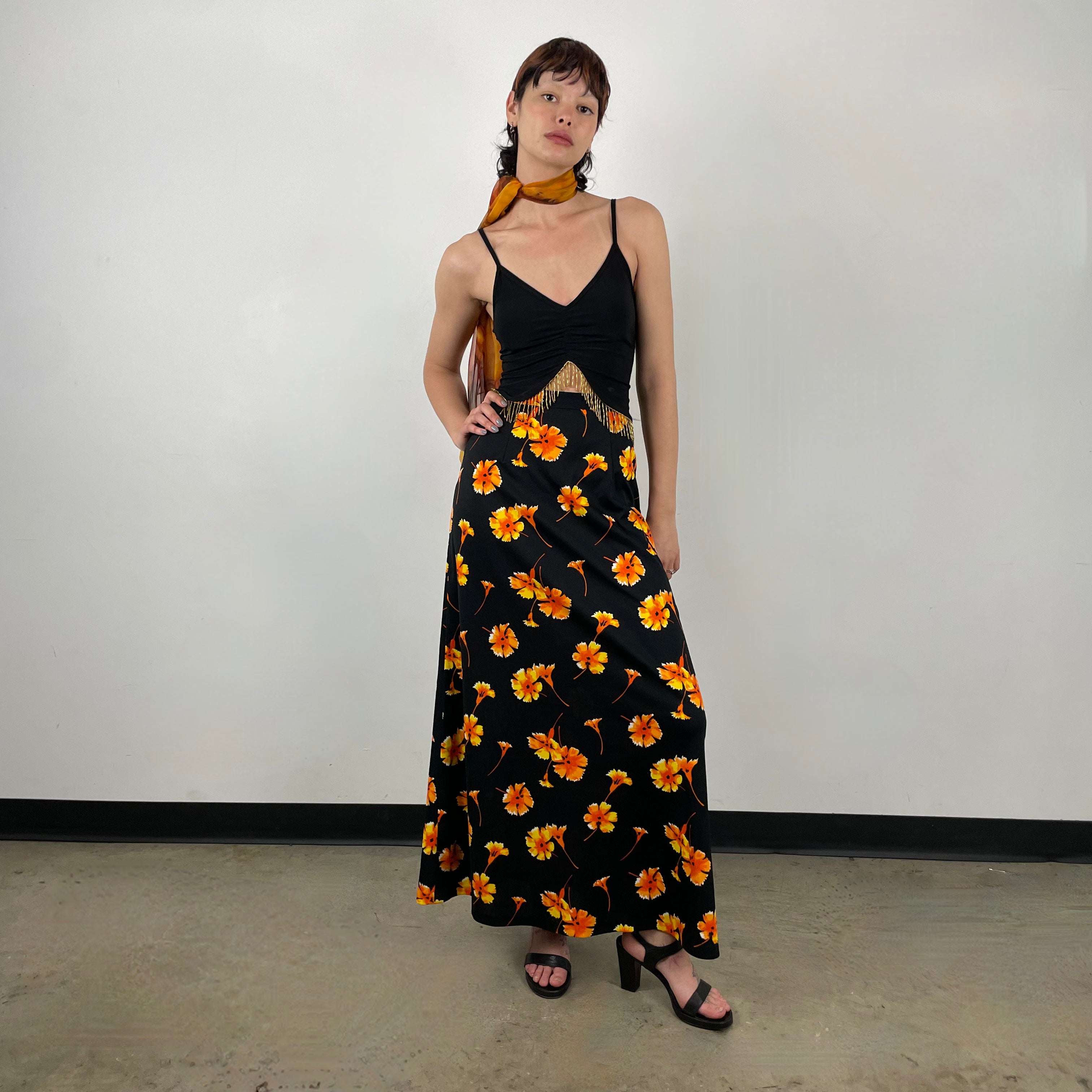 Front view of 1970s Black Floral Printed Maxi Skirt
Size Extra Small/Small
Sold at bohemevintage.com
Montréal