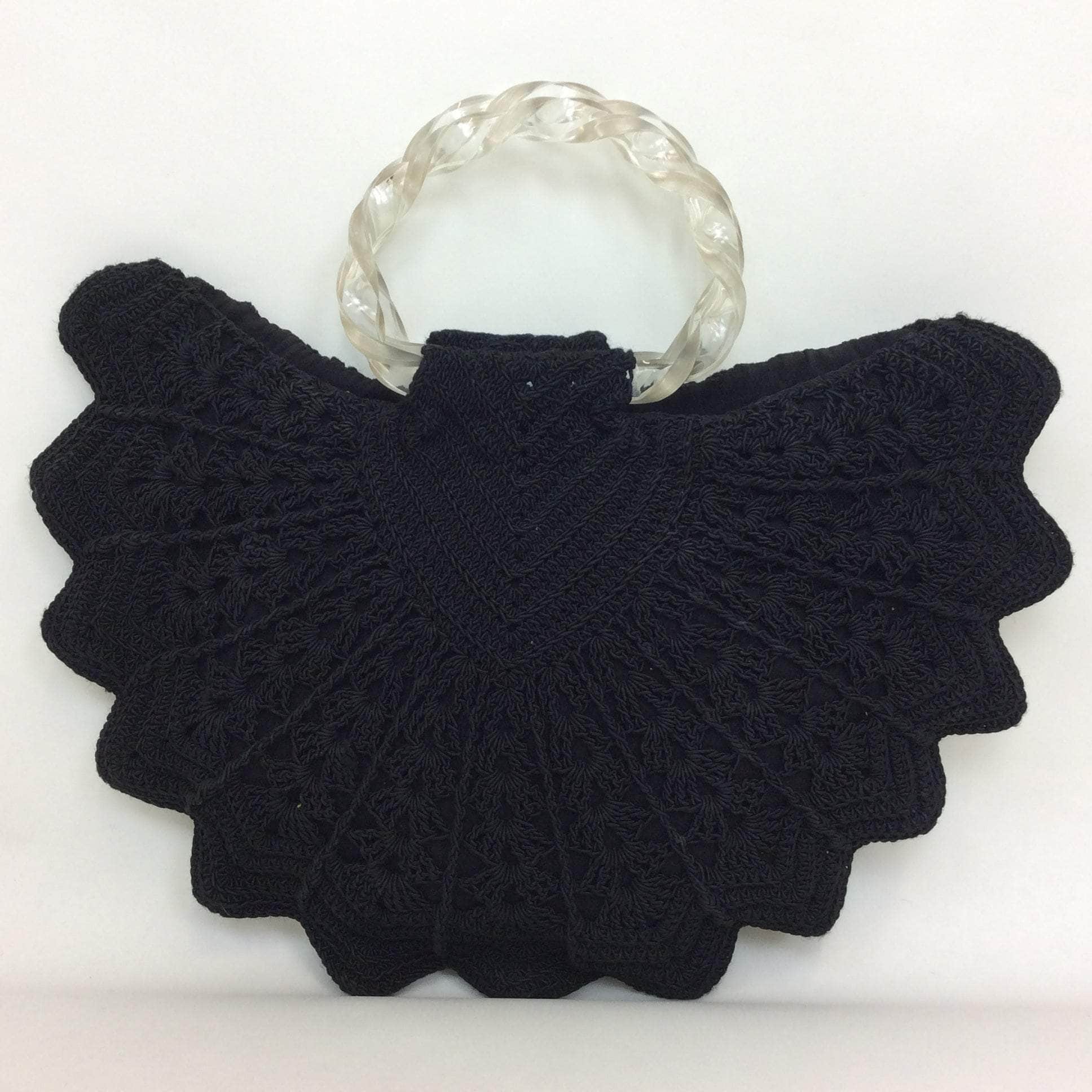 Boheme Vintage 1940s black crochet peacock‑shape evening handbag with clear twisted lucite handles and zipper closure.