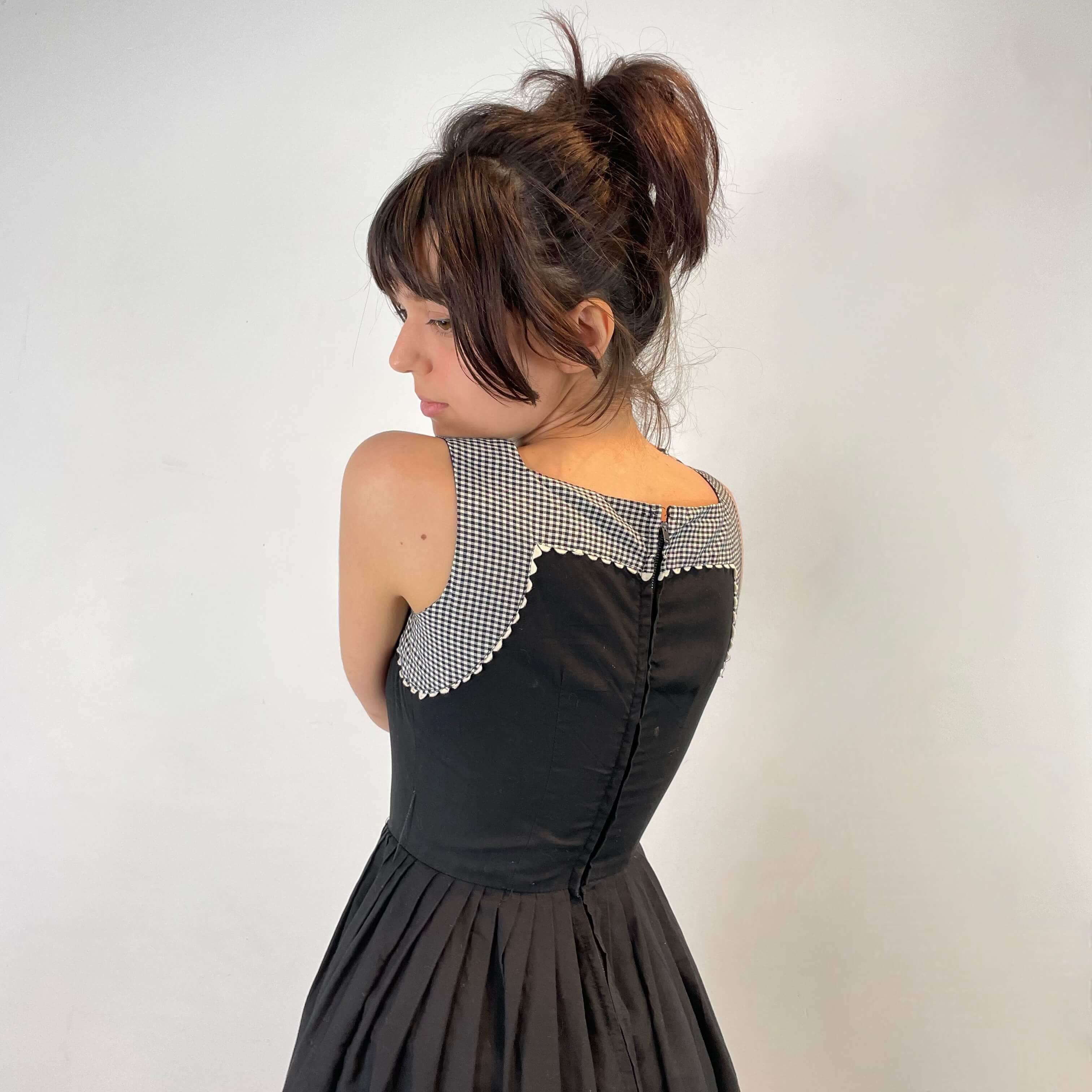 Back view of 1950s Black and White Cotton Petite Dress size Extra-Small sold on bohemevintage.com Montreal