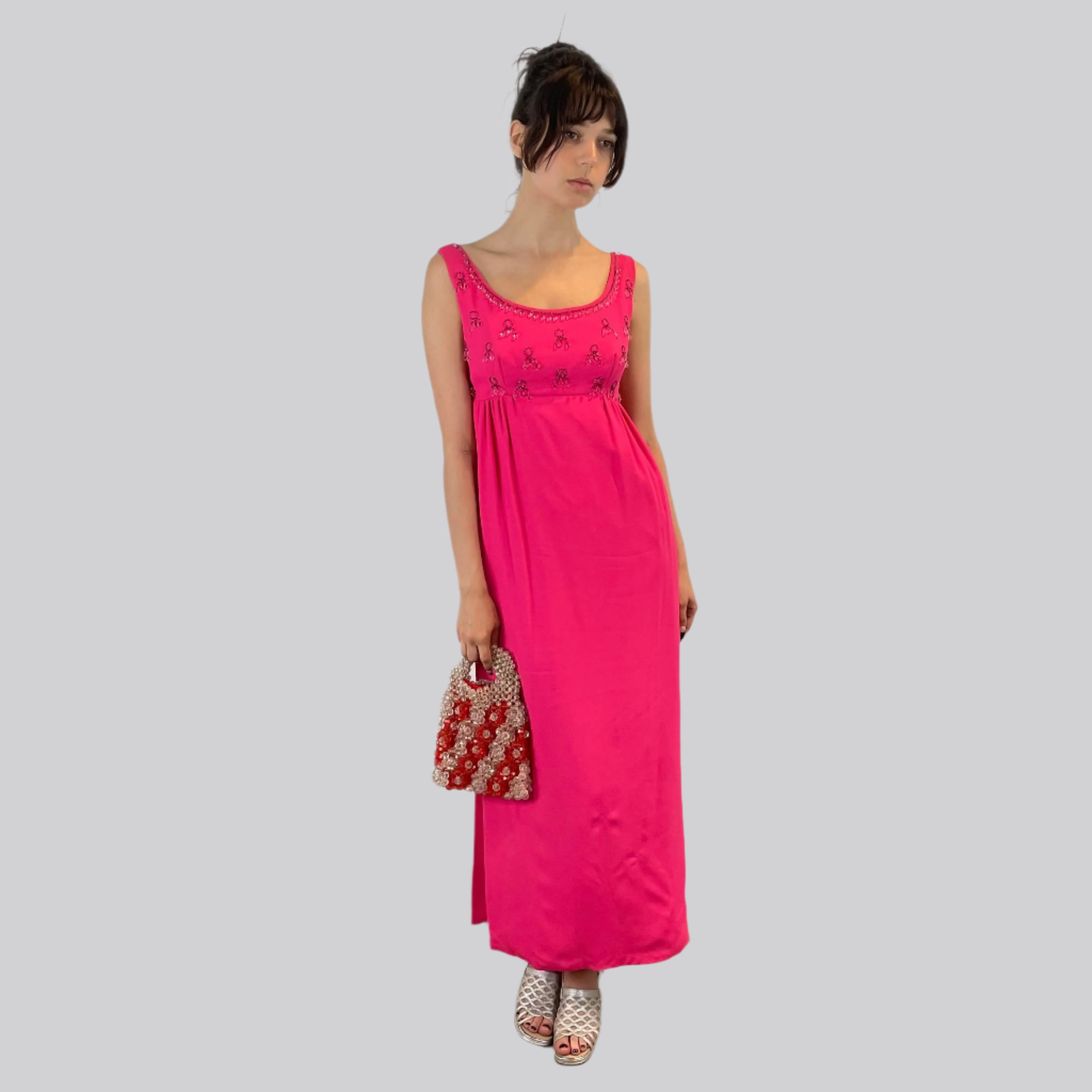 Front view of 1960s Fuchsia Empire Waist Beaded Gown Size X-Small/ Small sold at bohemevintage.com Montreal