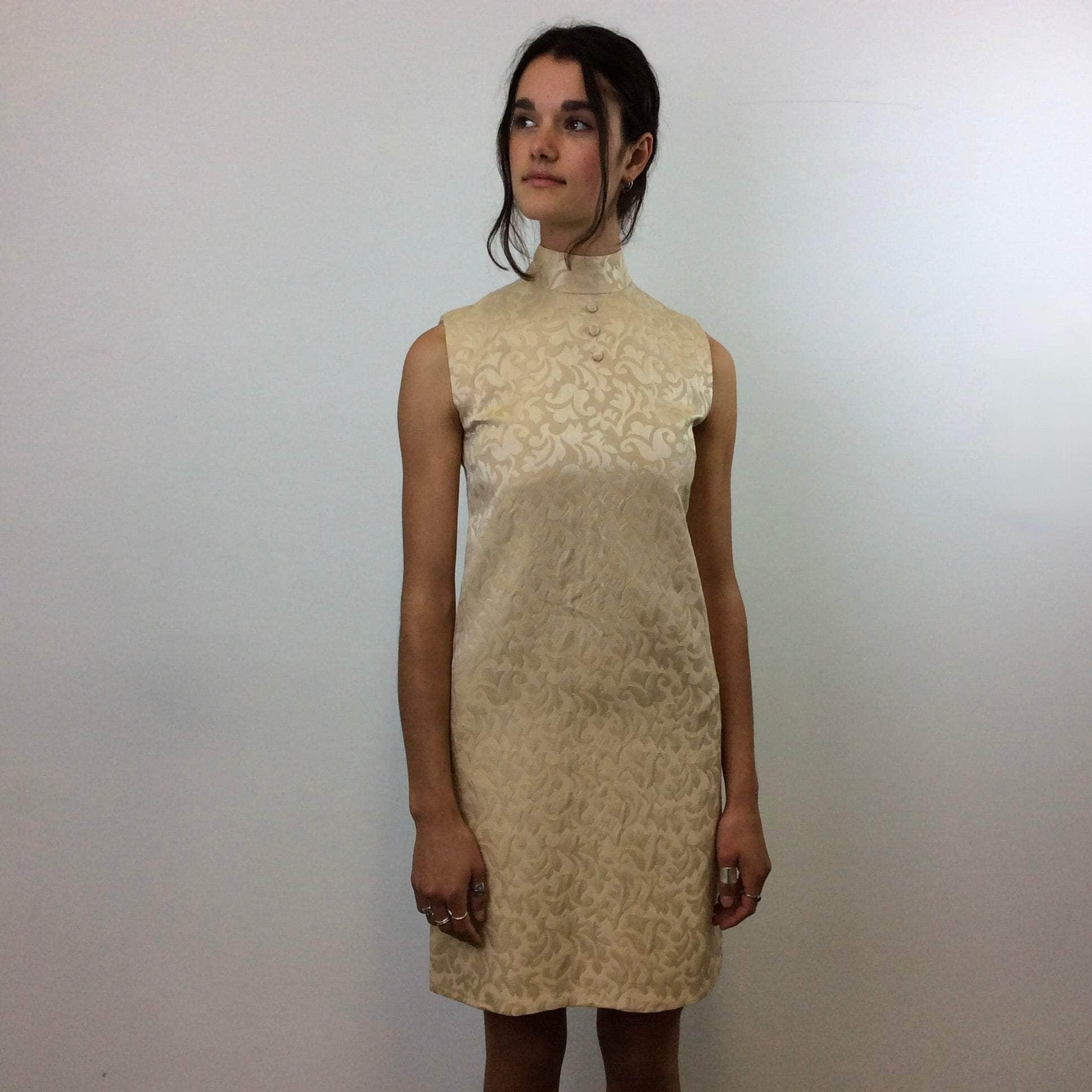 1960s Beige Brocade Sleeveless Satin Shift Dress Small. Sold by Bohème Vintage. Montreal.