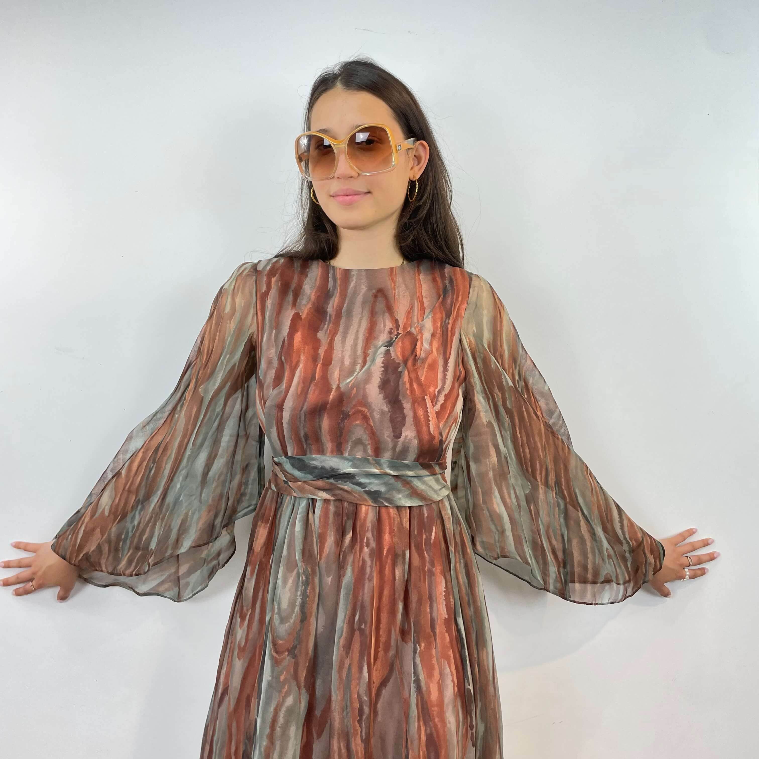 Front view of 1970s Floor-Length Boho Chic Flowy Gown size Small/Medium sold at bohemevintage.com Montreal