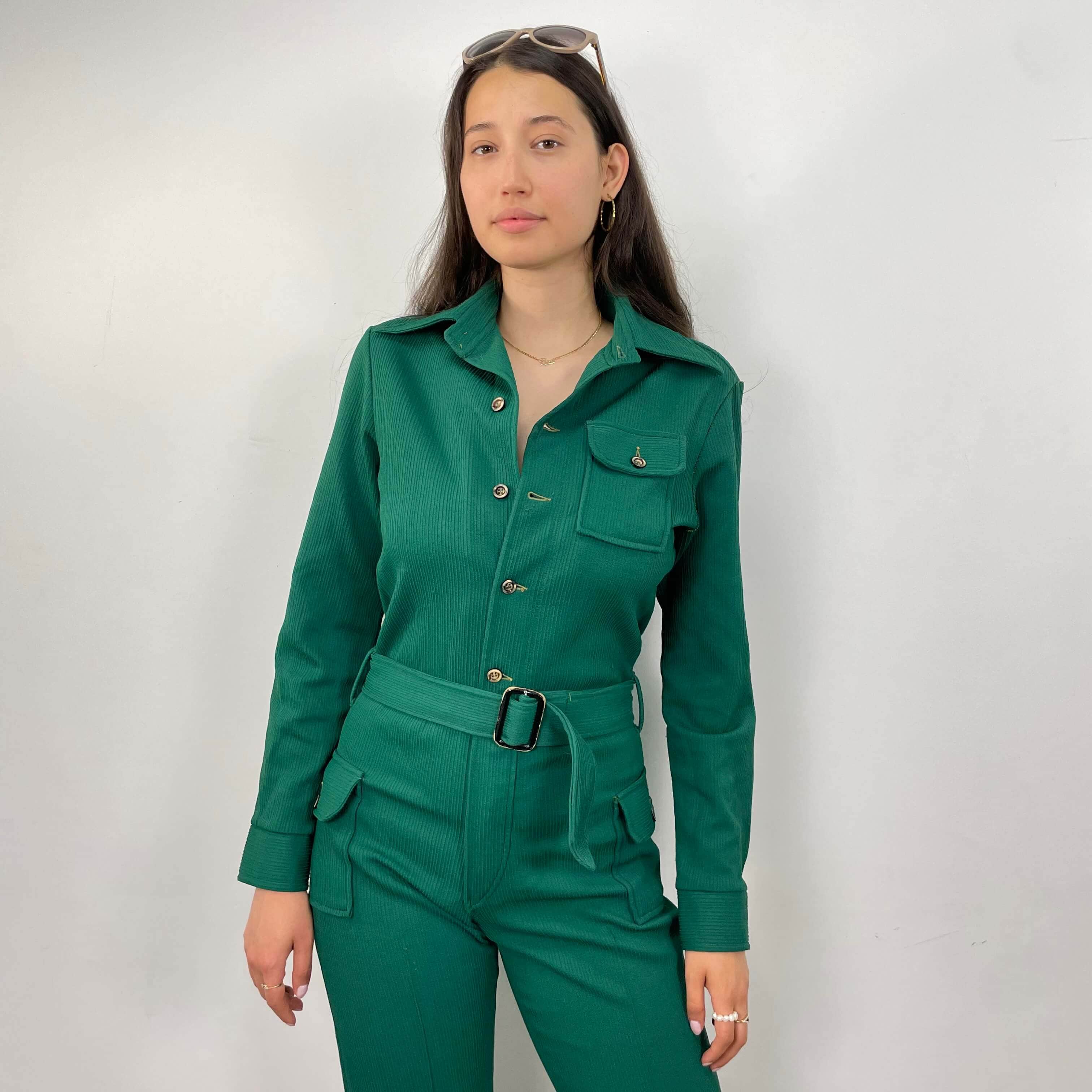Front view of 1970s Long Sleeve Green Jumpsuit Size Medium sold on bohemevintage.com Montreal