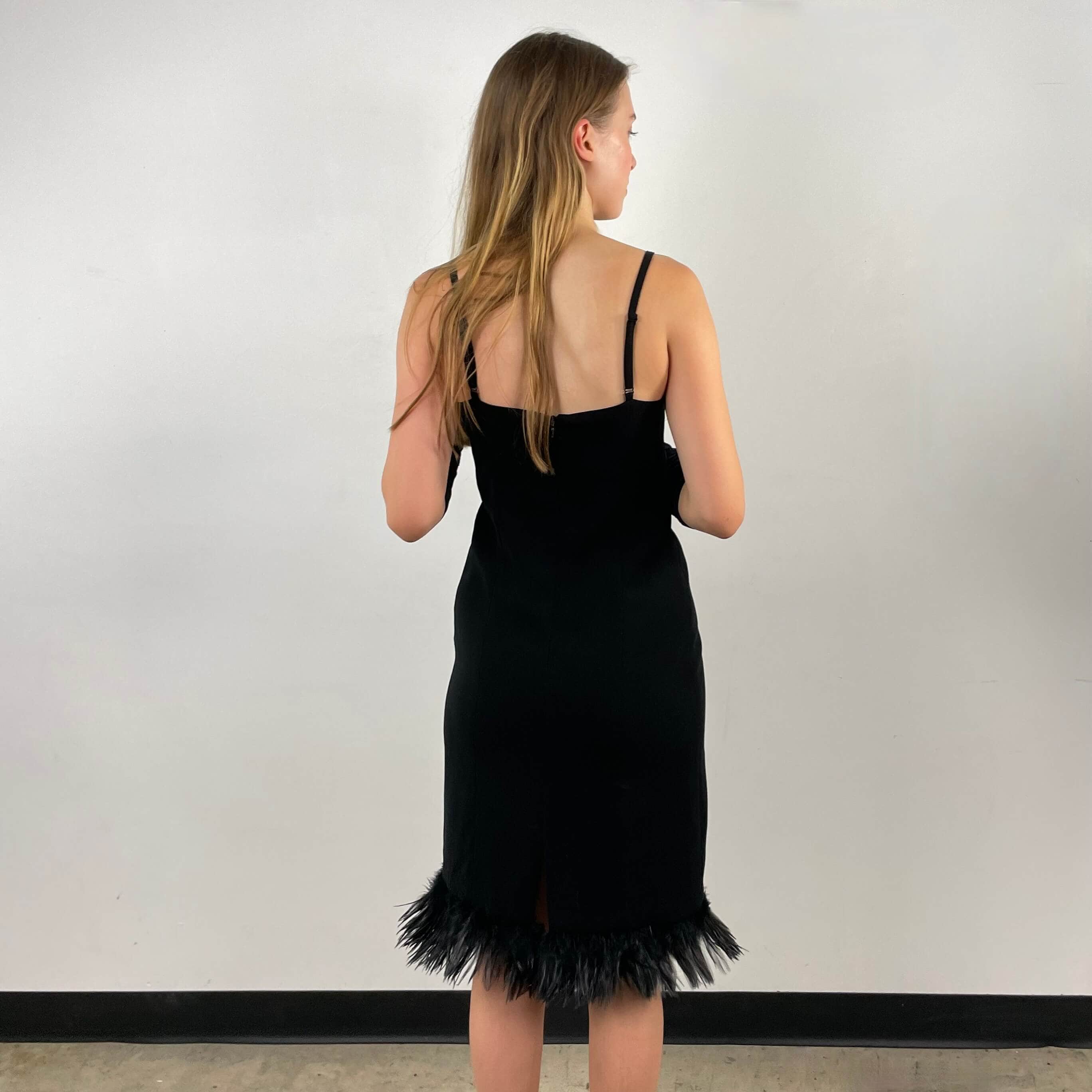 Back view of 1990s Black Slip Dress with Feathers Size small-Medium sold on bohemevintage.com Montreal