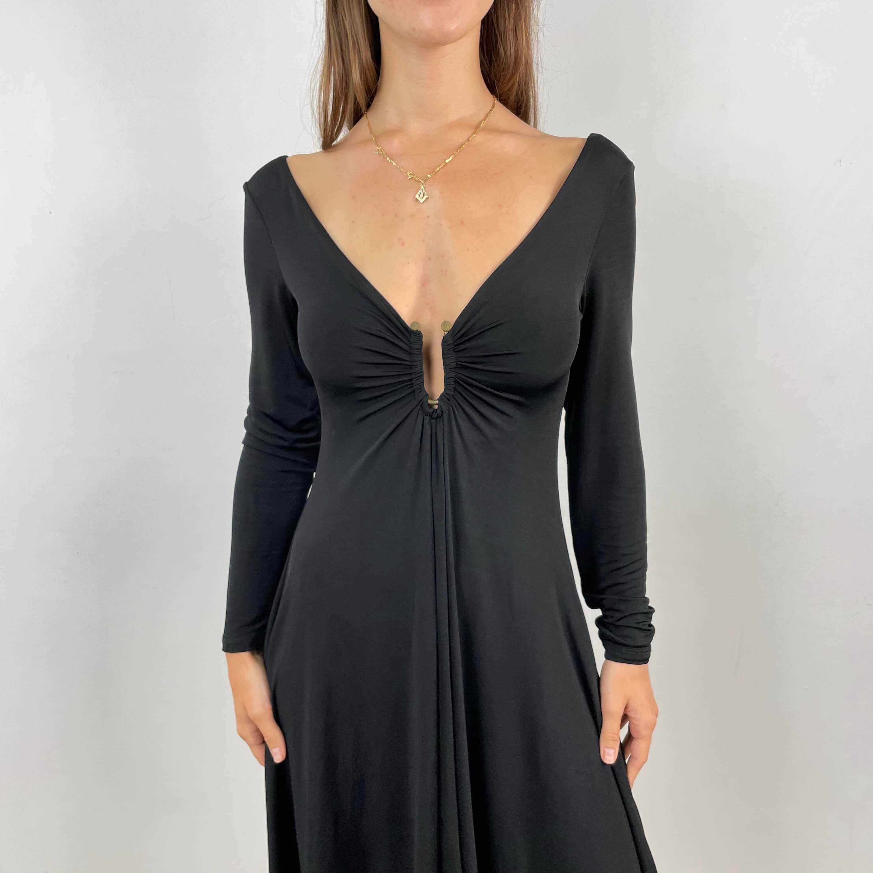 Close-up view of decolleté of Just Cavalli Long Sleeve Flared Black Dress Siize Small/Medium sold on bohemevintage.com Montreal