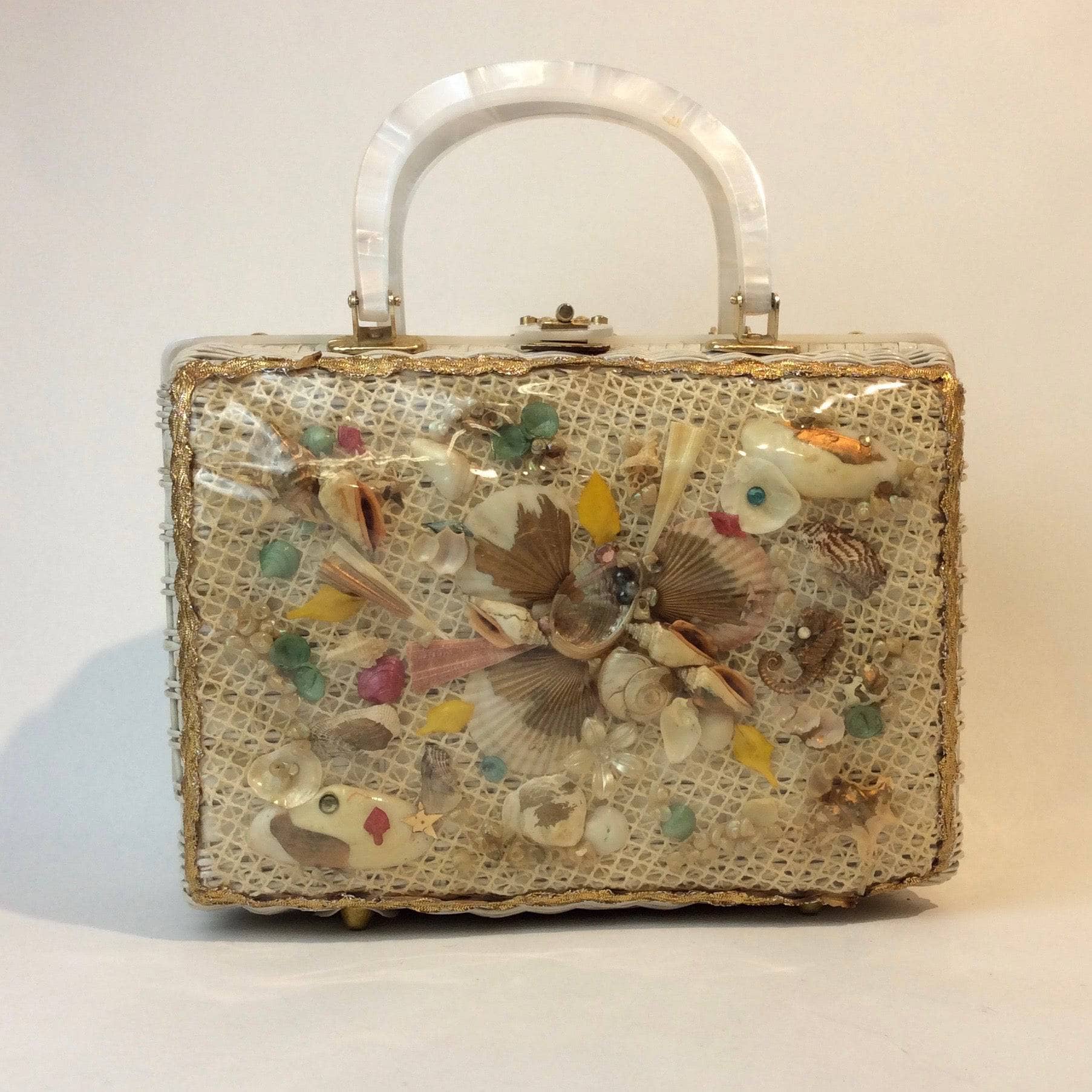 1950s-60s Seashell White Wicker Basket Purse sold by bohemevintage.com Montreal