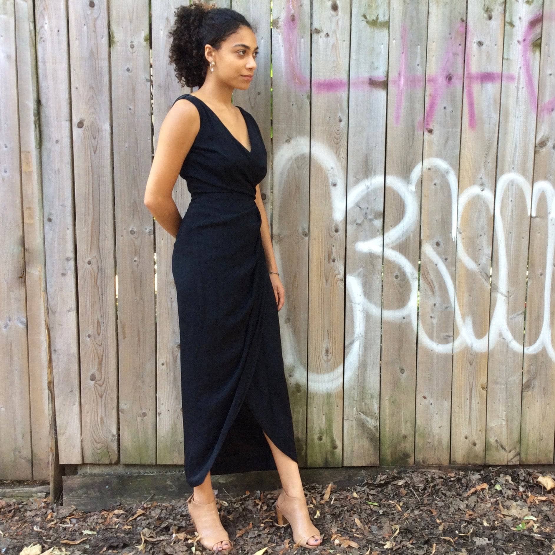 Side view of 1950s Black Maxi Sleeveless Wrapped Gown, size Small sold by bohemevintage.com Montreal