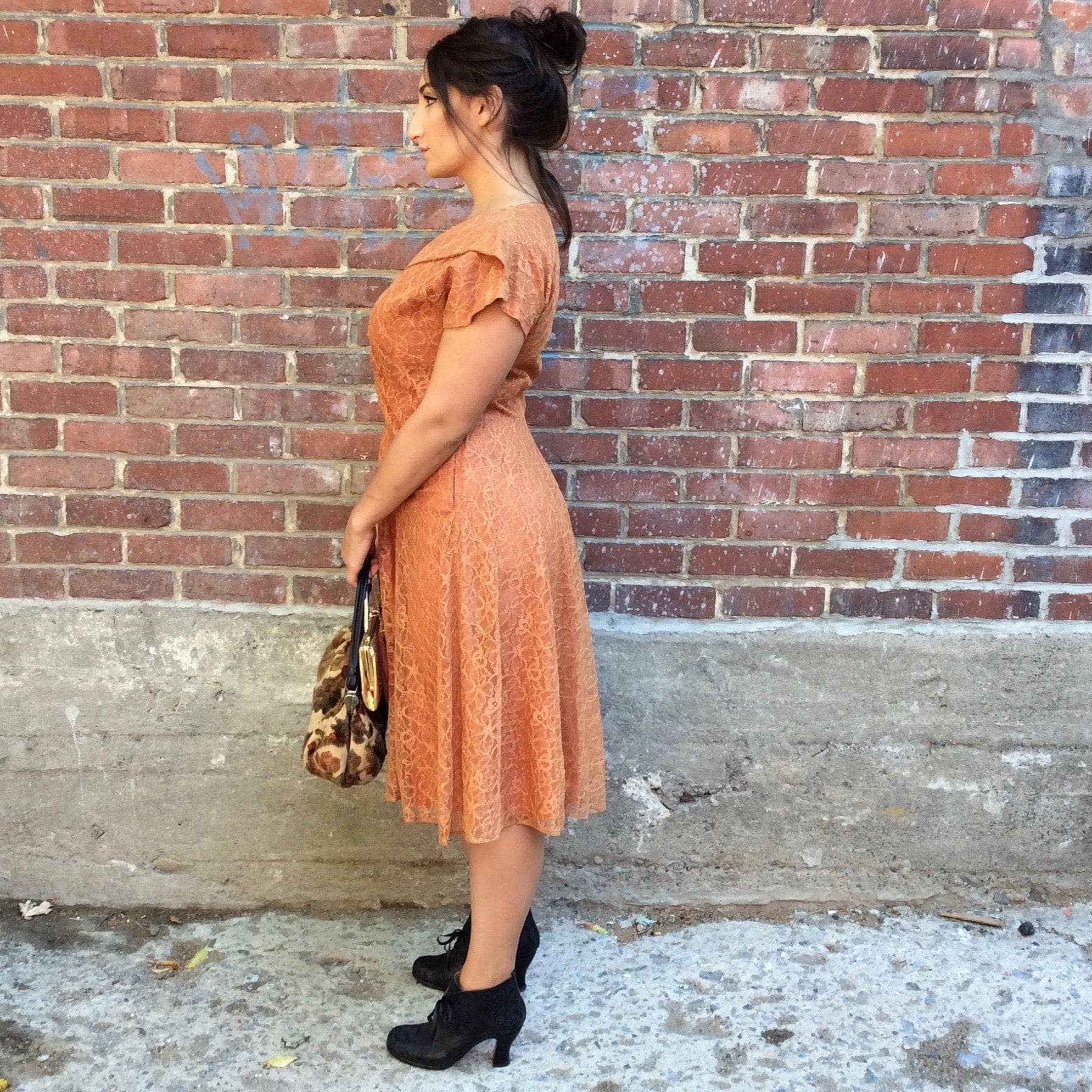 Side view of 1950s Short Sleeve Copper Lace Dress size Medium sold by bohemevintage.com Montreal