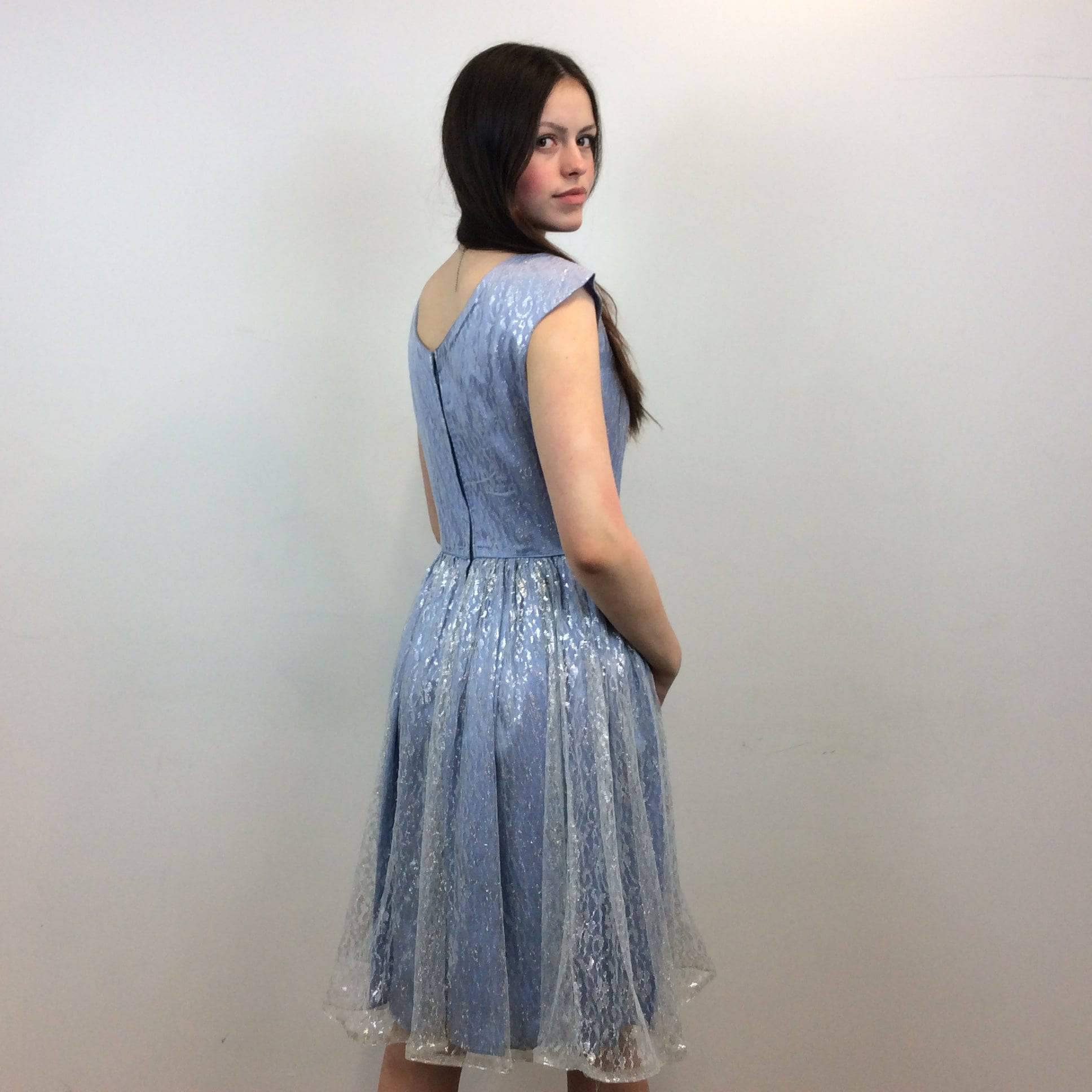 Back view of 1950s Silver Lace Party Dress, Fit and Flare Dress, size Small-Medium, Colour Blue sold at bohemevintage.com Montreal