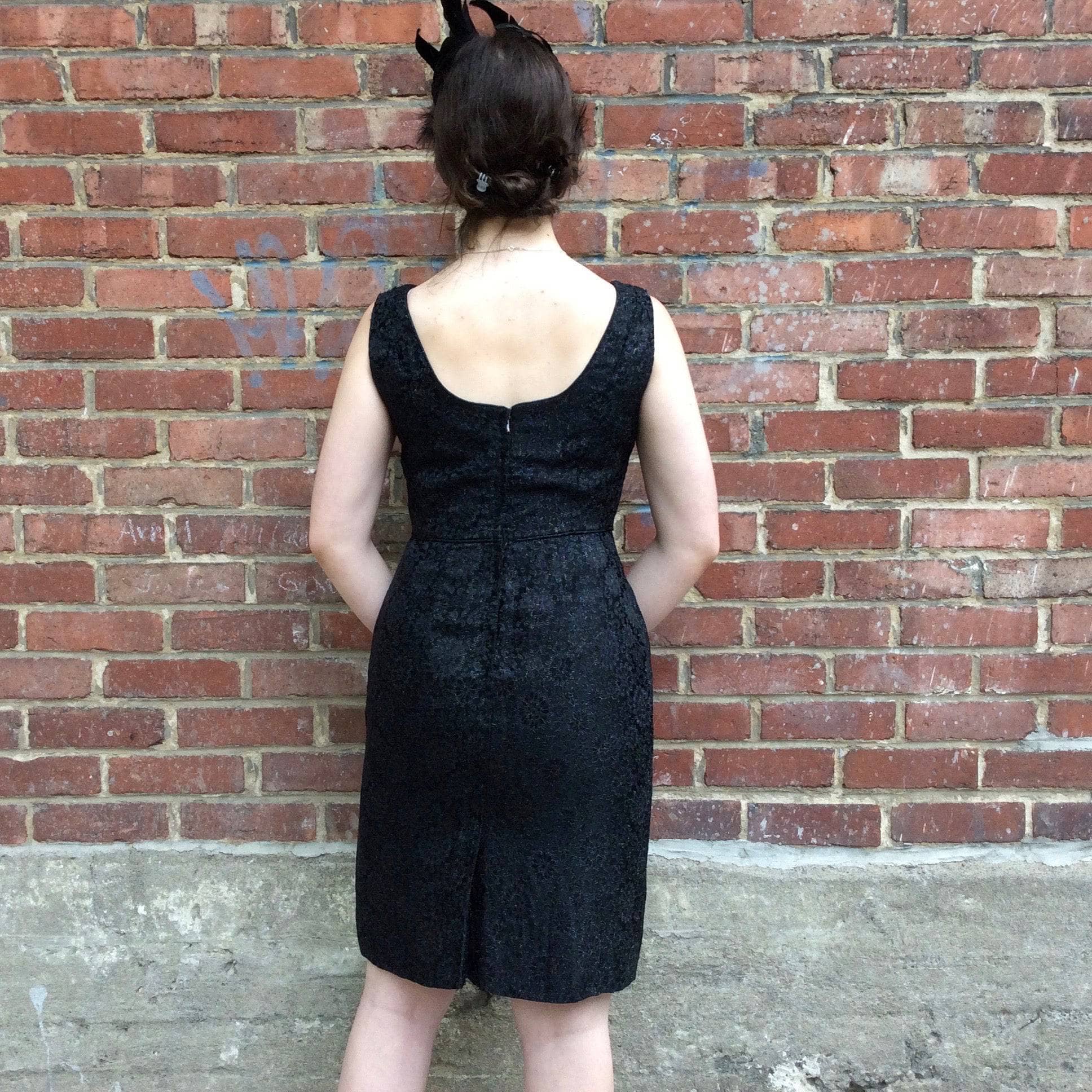 Back View of 1950s Sleeveless Knee-length Black Brocade Dess Size Small sold by bohemevintage.com Montreal