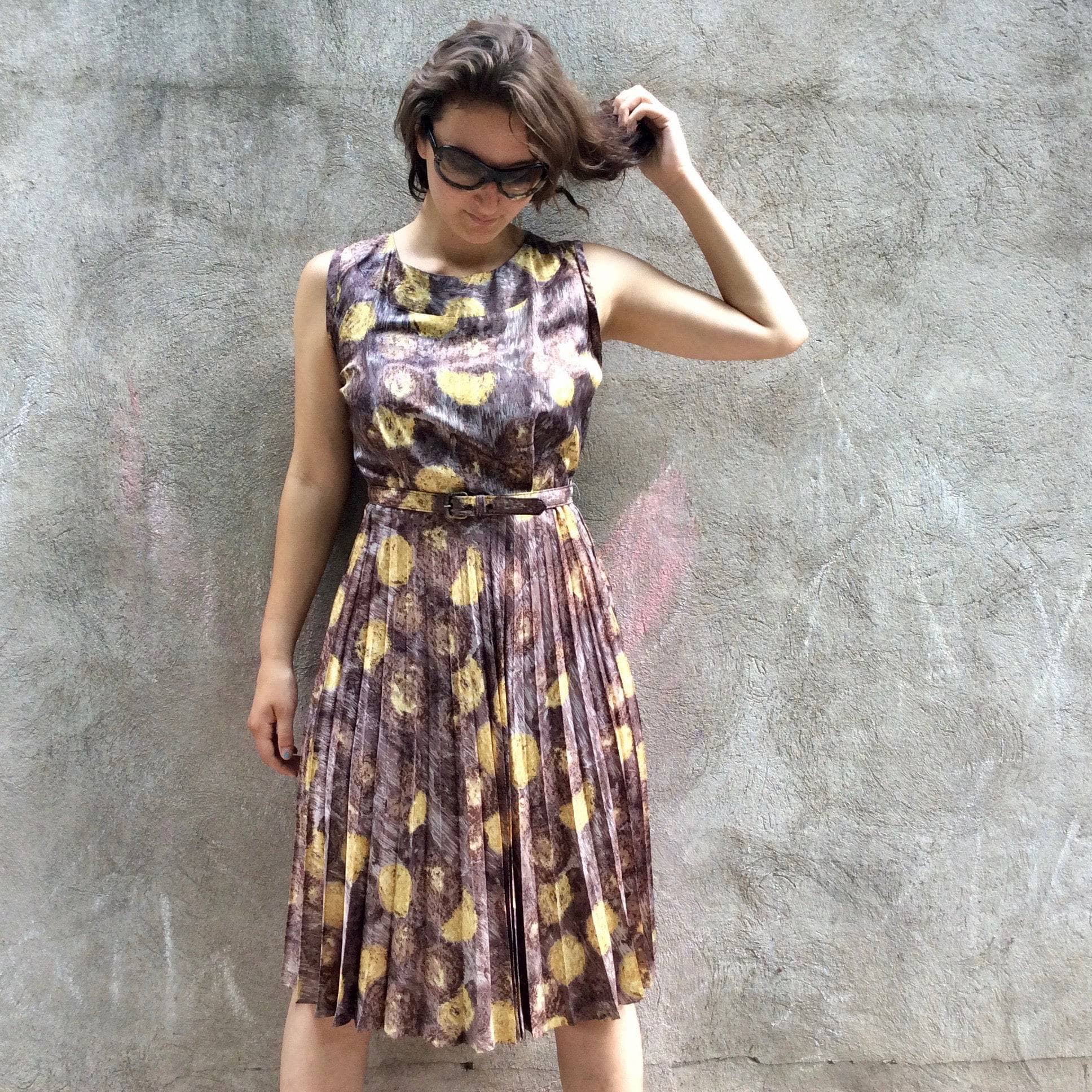 1950 Sunburst Pleated Sleeveless Dress Size Medium sold by bohemevintage.com Montreal