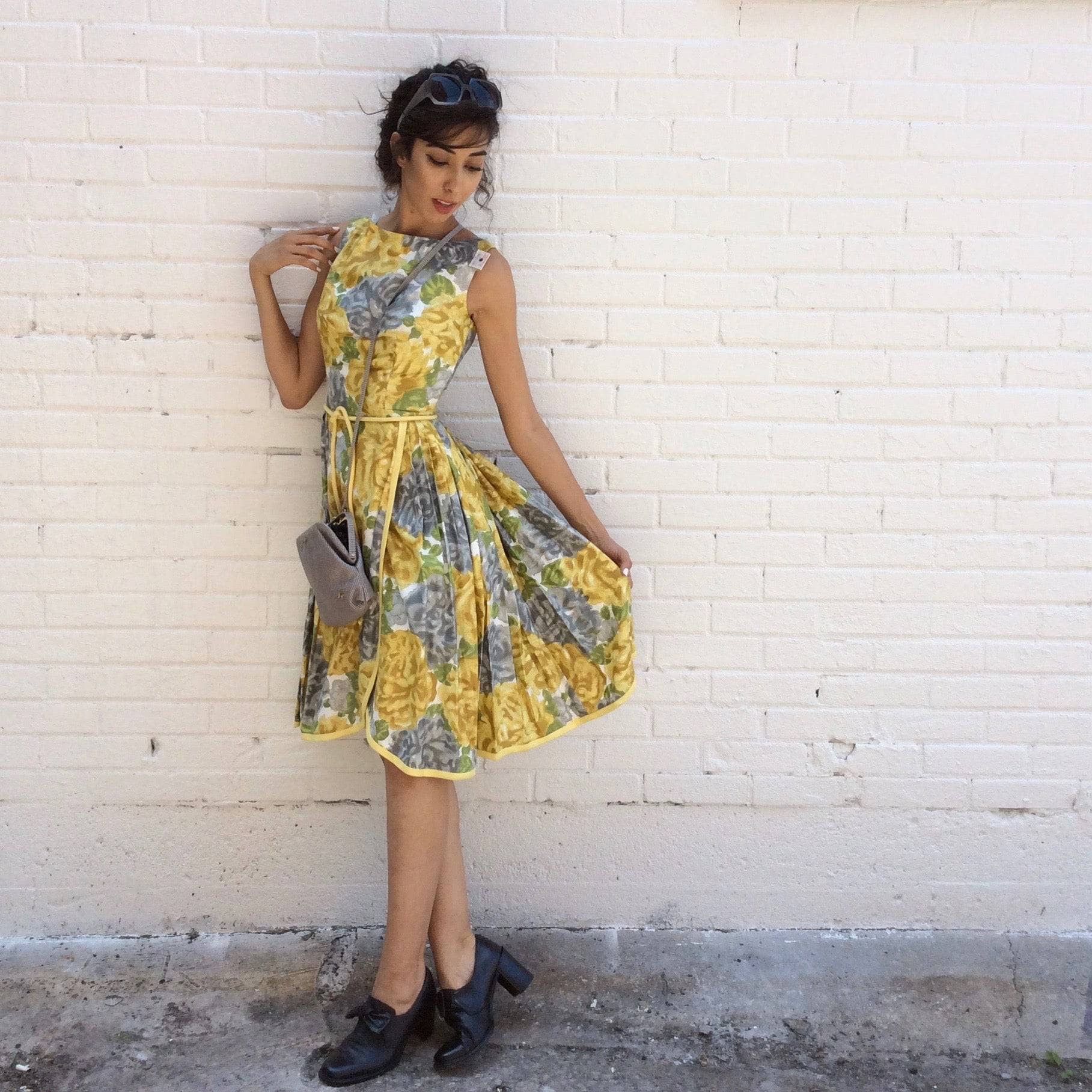 Side view of 1950s Yellow Floral Cotton Dress Size Small sold by bohemevintage.com Montreal