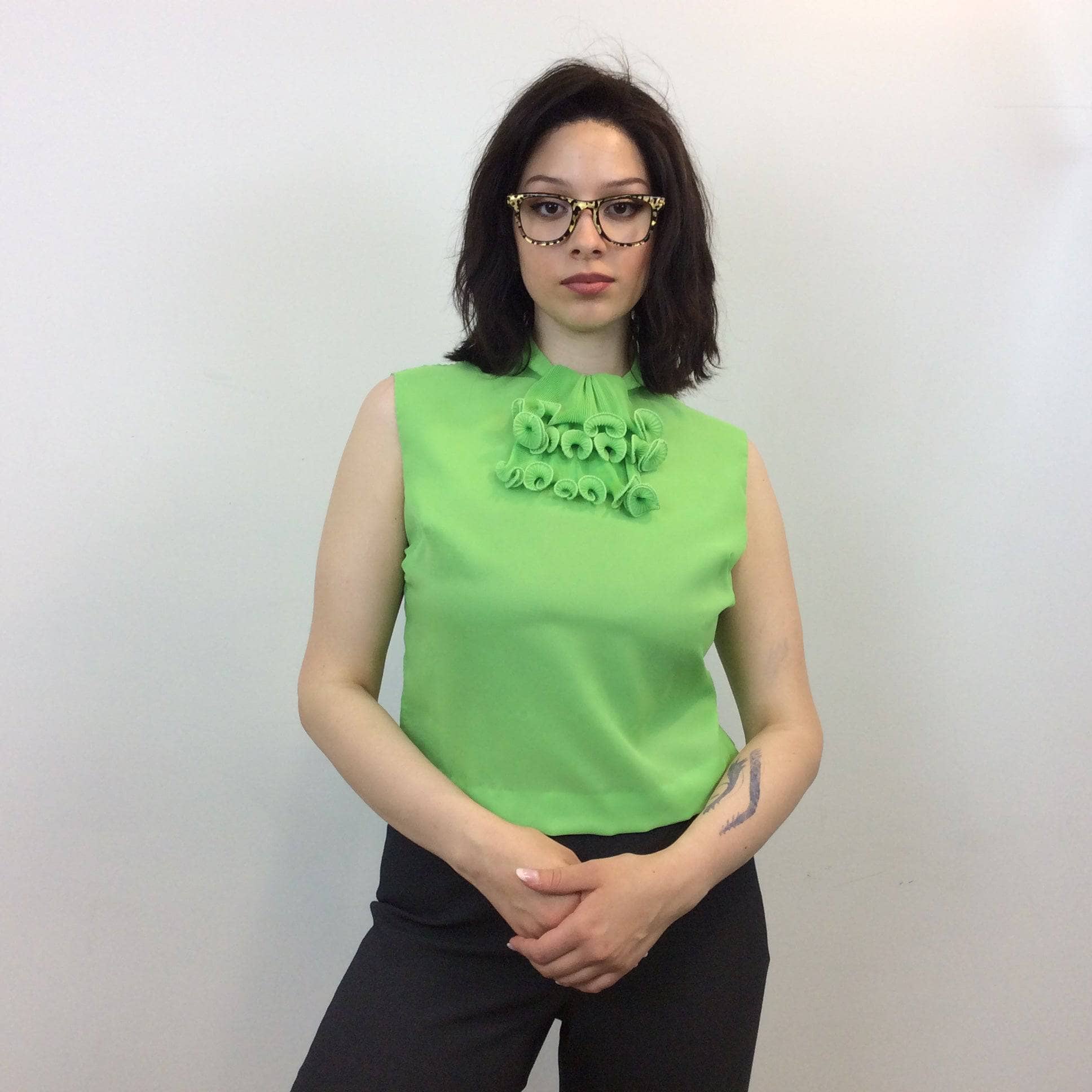 1960s Lime Green Sleeveless Cropped Blouse with Jabot Collar. Sold by bohemevintage.com Montréal