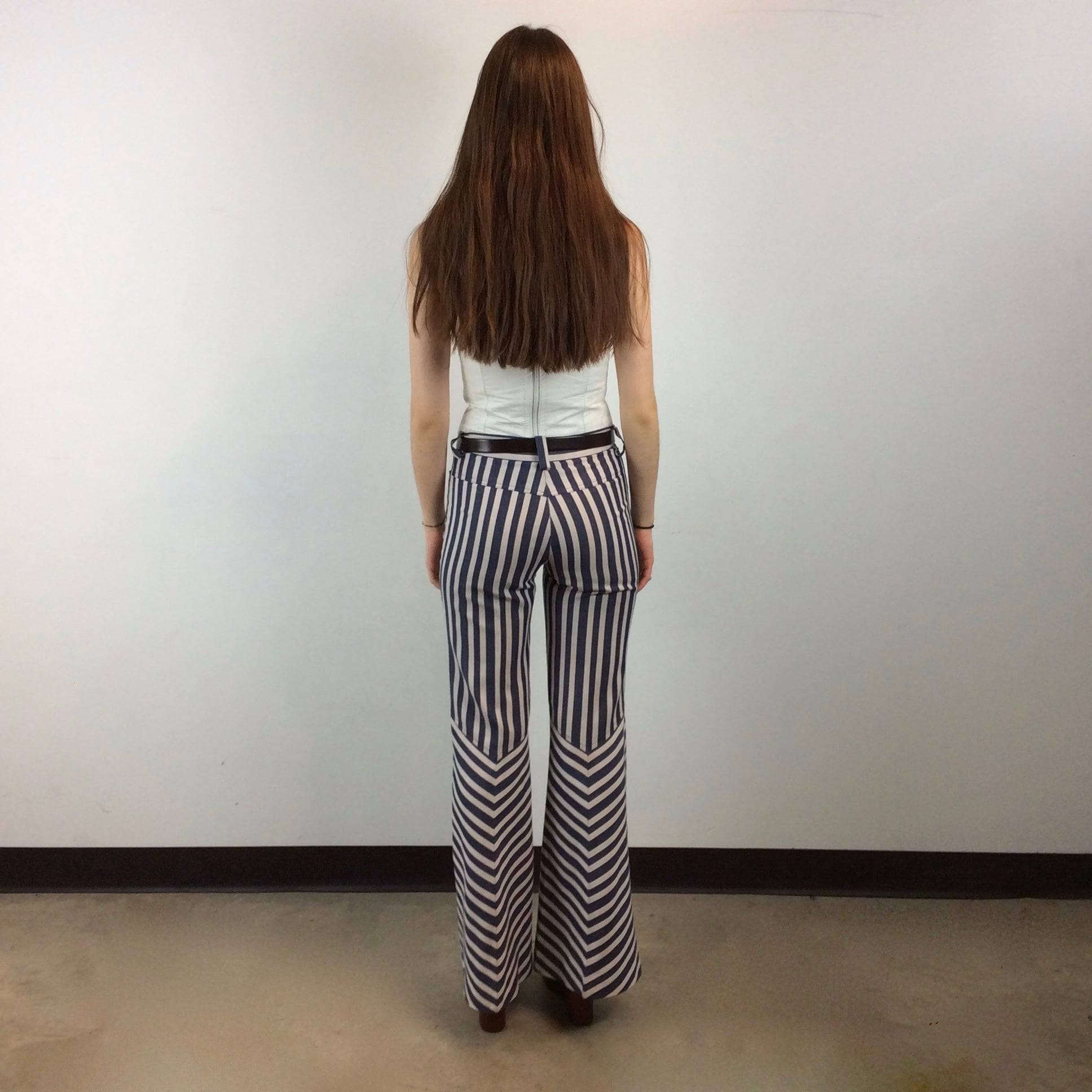 Back view of 1970s Striped Bell Bottom Jeans Size X-Small / Small sold by bohemevintage.com Montreal