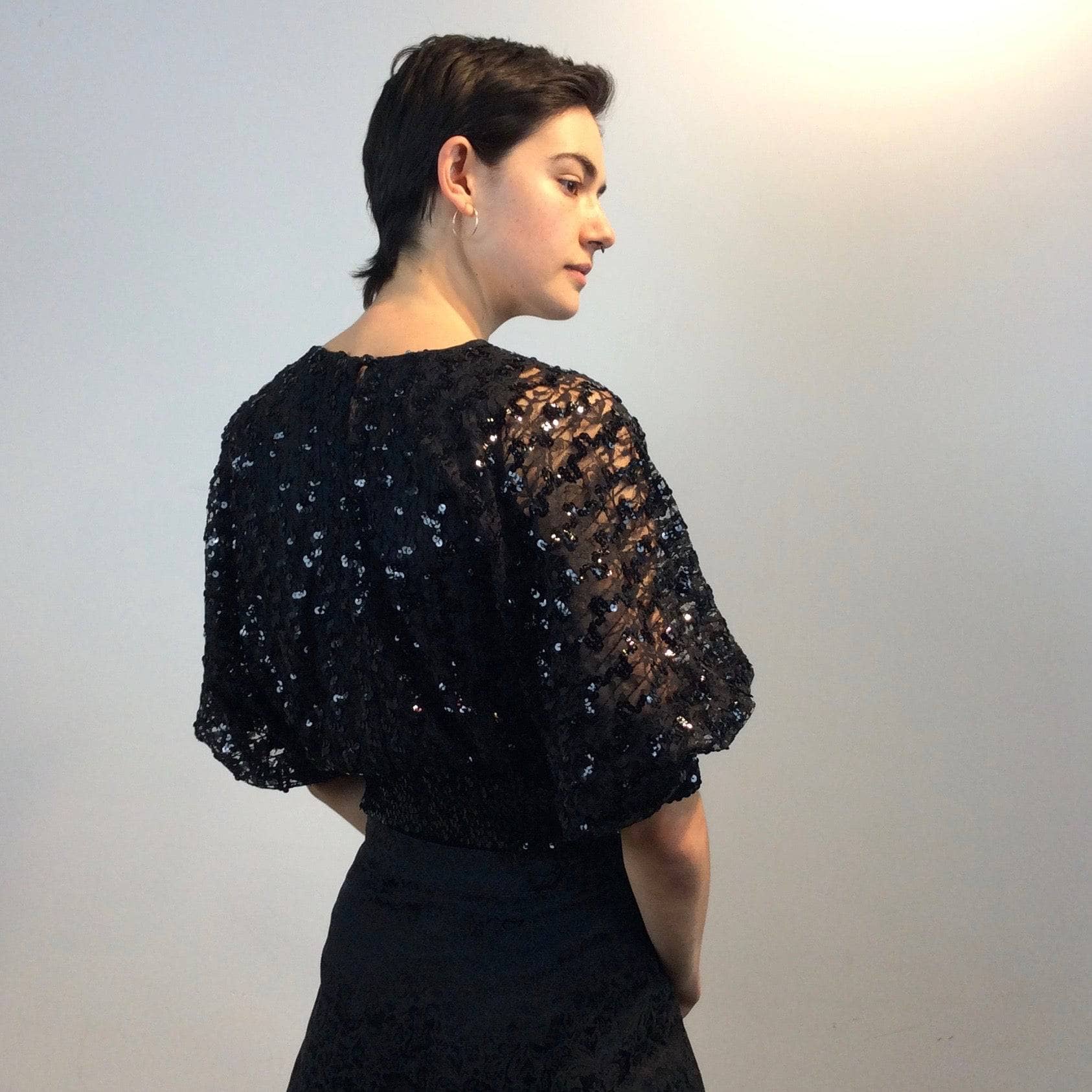 1980s Batwing Sleeve Lace and Sequin Black Top Size small-Medium sold by bohemevintage.com Montreal