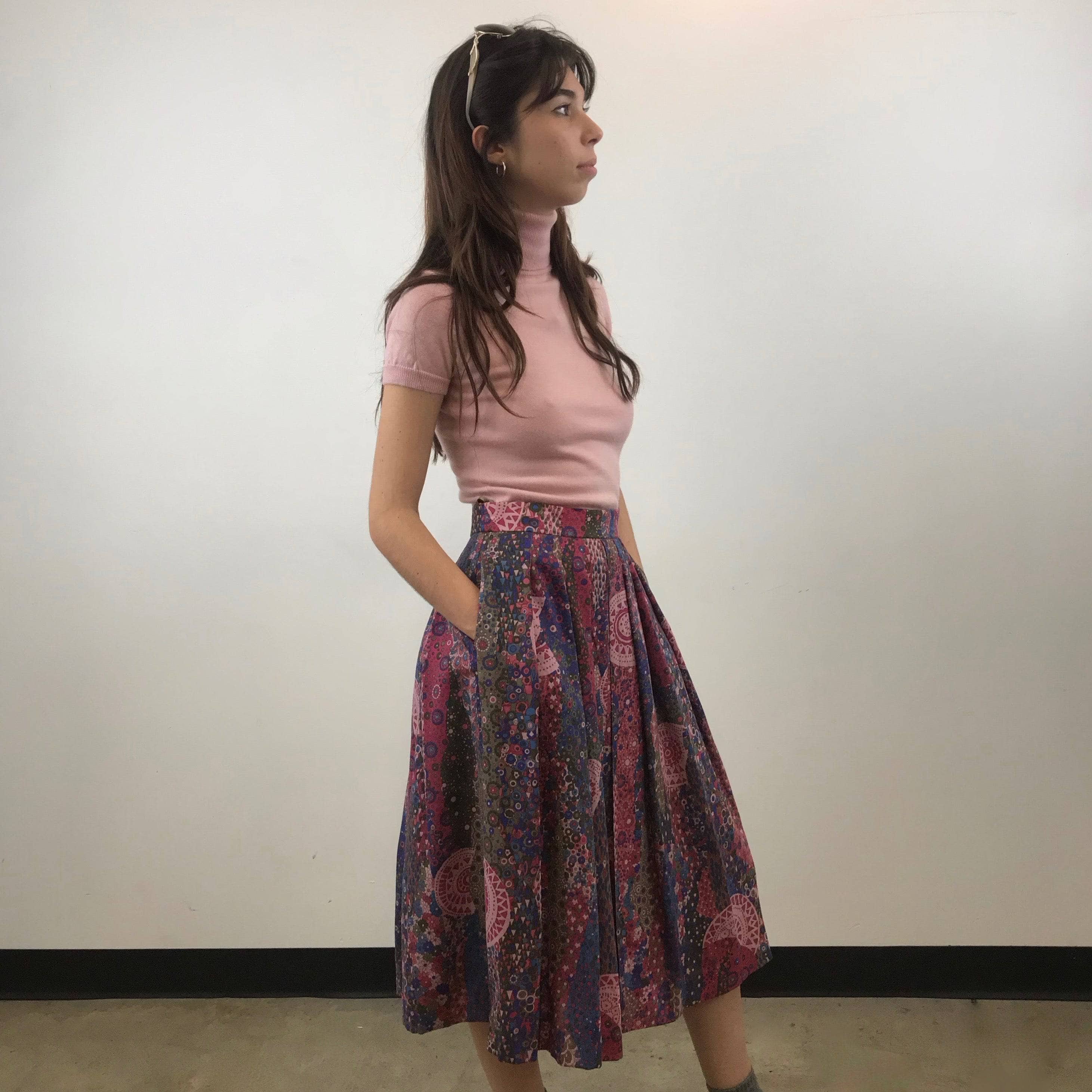 Side view of 1990s Geiger Midi Length Foulard Print Pleated Midi Skirt Size small, sold by Bohemevintage.com