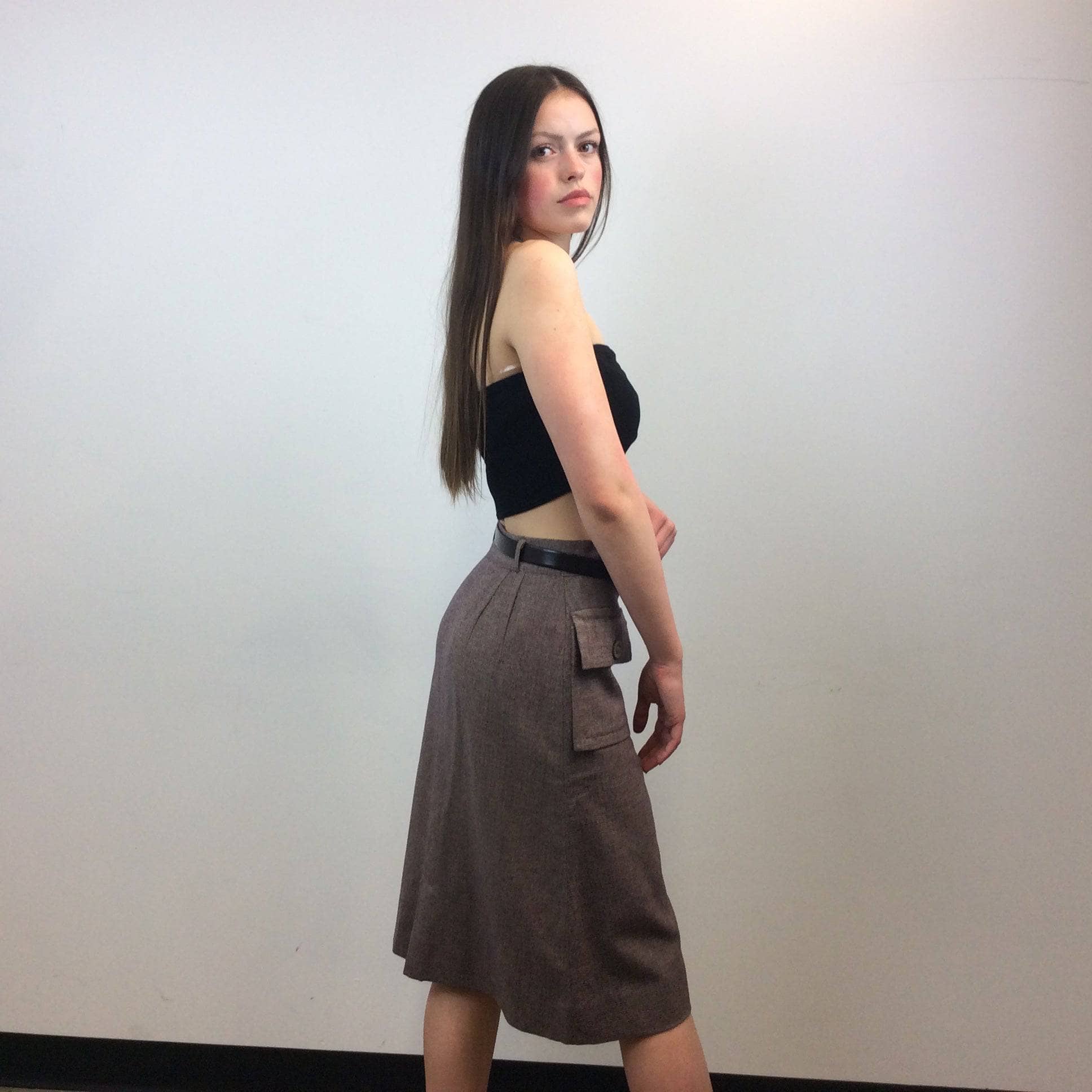 Side view of 1940s A-line Midi Wool Skirt Size Small sold by bohemevintage.com Montreal