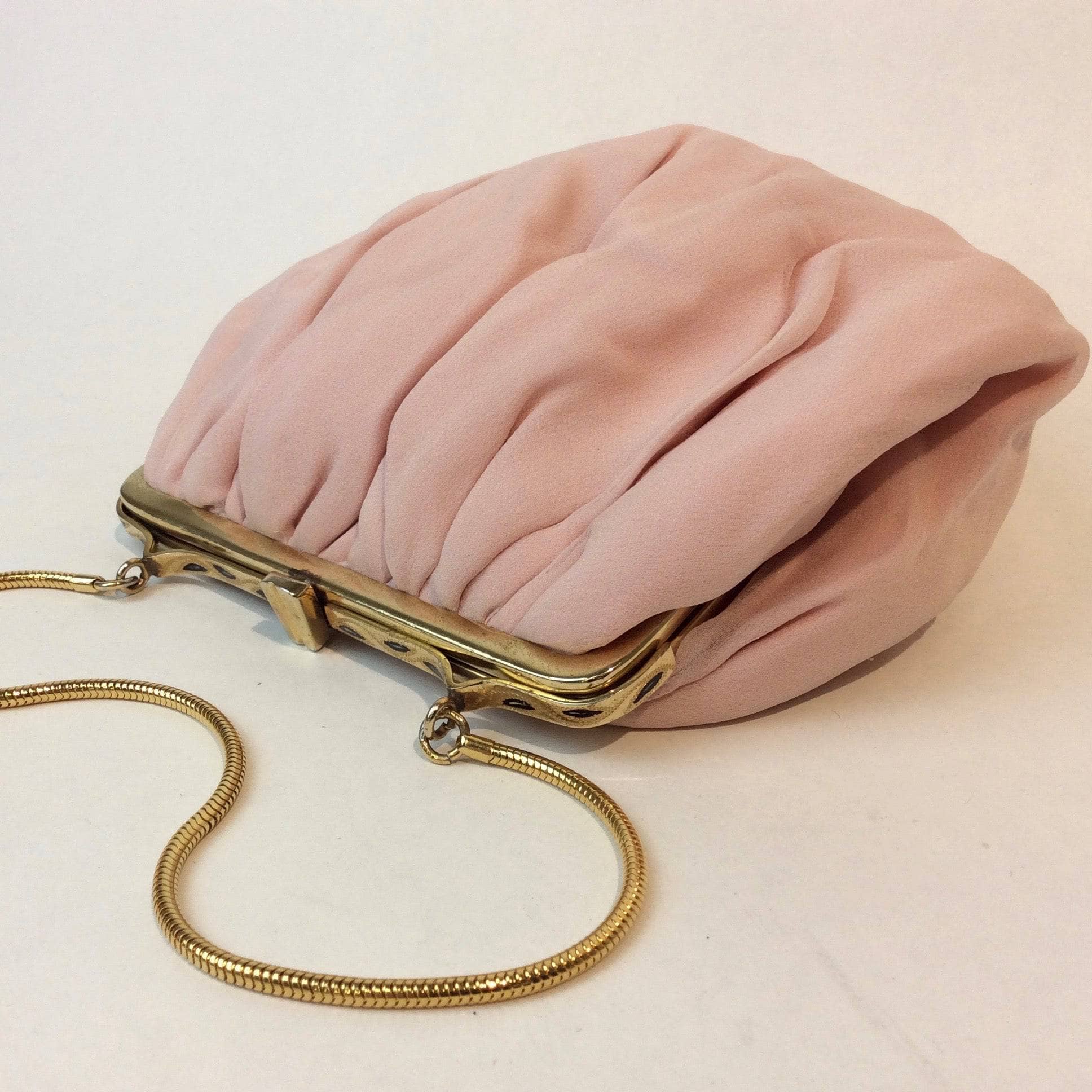 1950s Light Pink Silk Crepe Evening Bag. Sold at bohemevintage.com Montreal