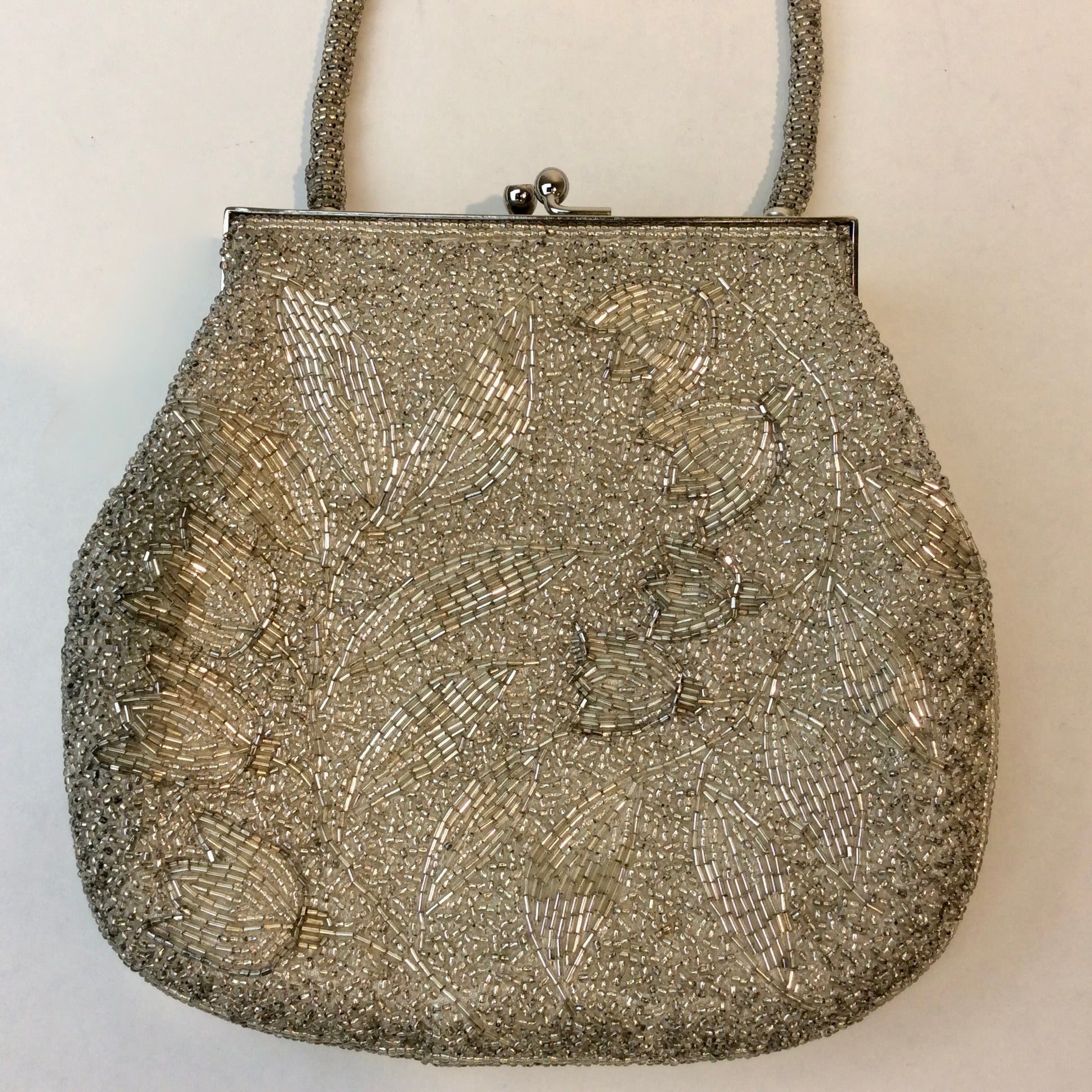 Boheme Vintage 1950s silver beaded evening handbag with floral beadwork, kiss‑lock closure, and beaded strap.