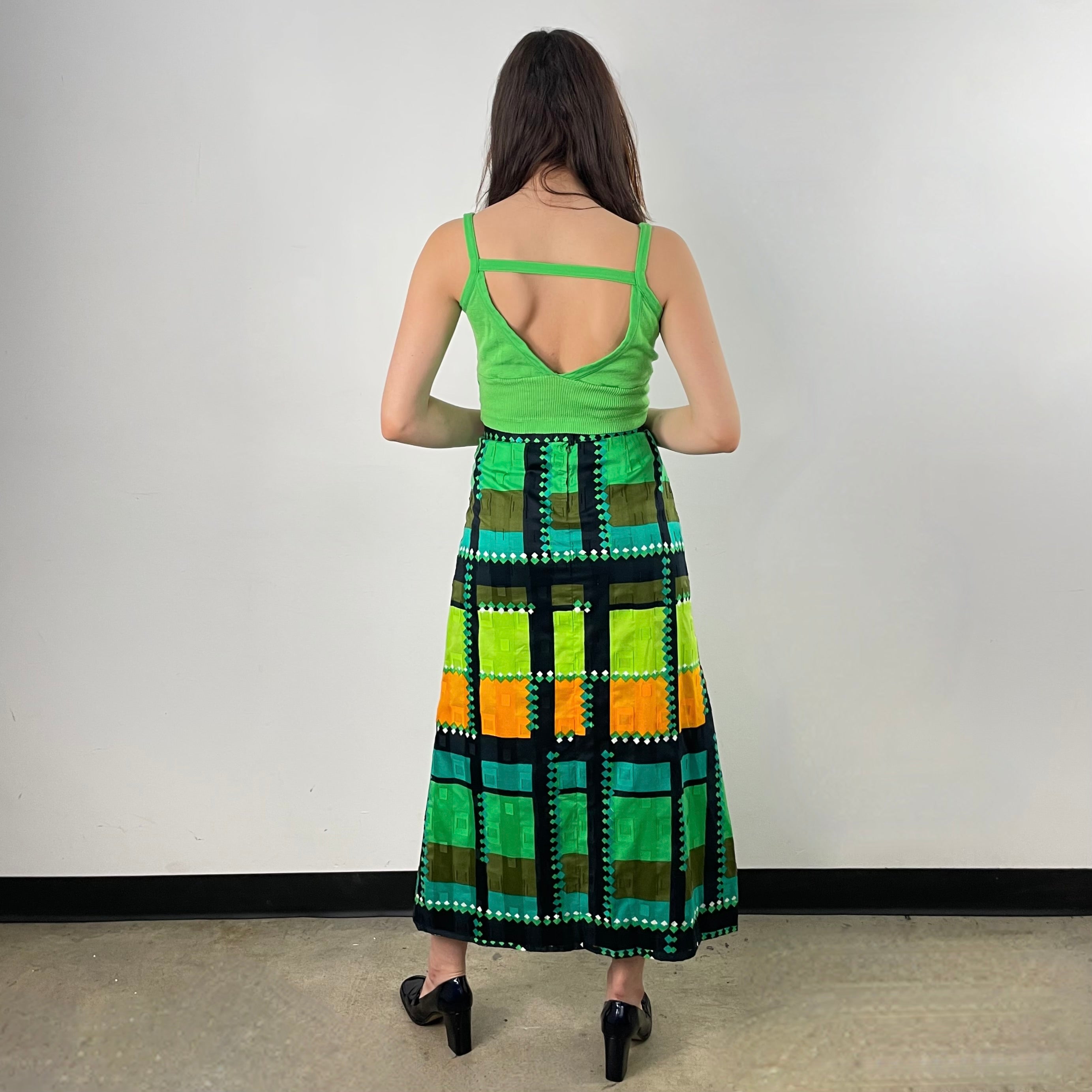 Boheme Vintage 1970s handmade floral cotton A-line midi skirt with gathered waist, side slit, and lightweight cotton lining.