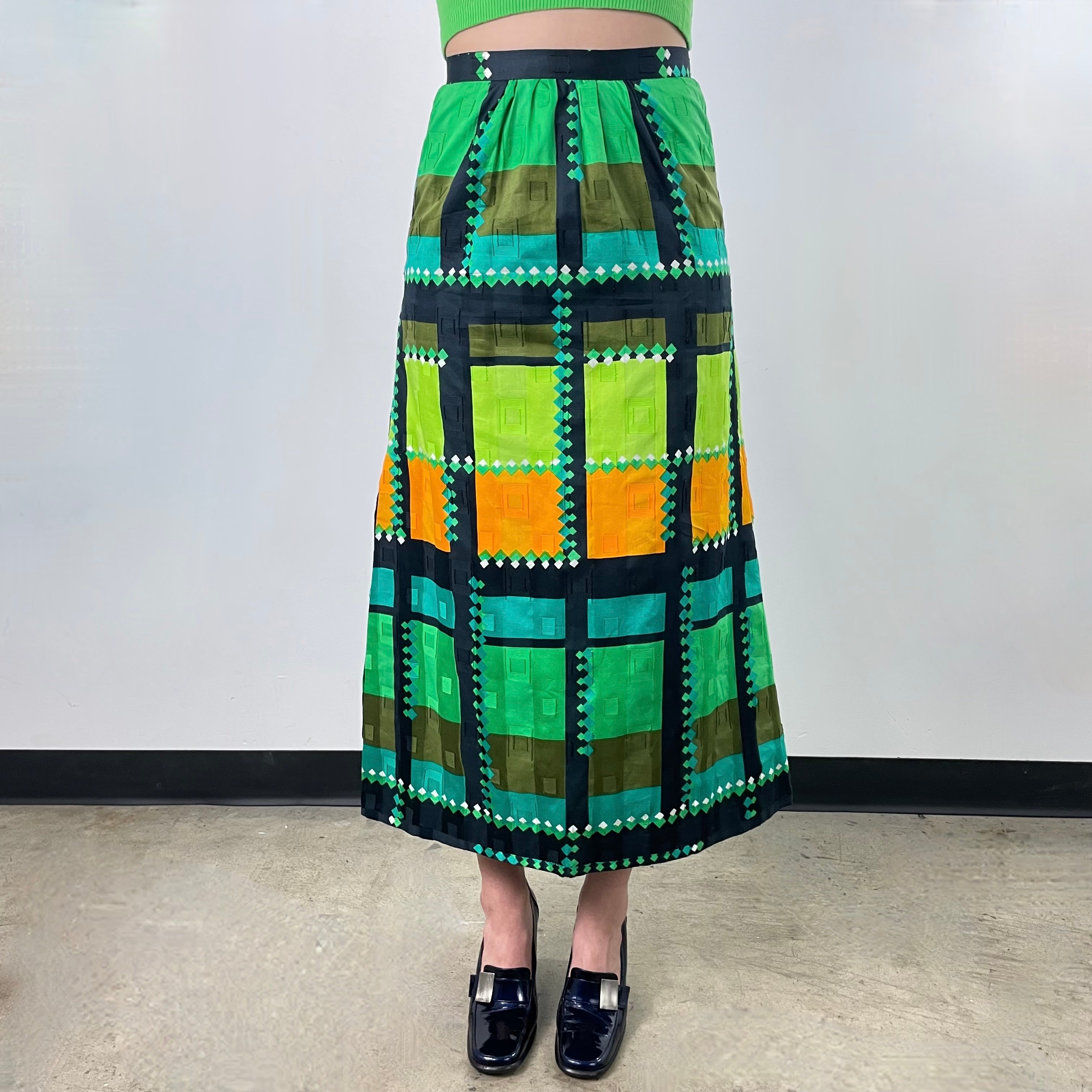 Boheme Vintage 1970s handmade floral cotton A-line midi skirt with gathered waist, side slit, and lightweight cotton lining.