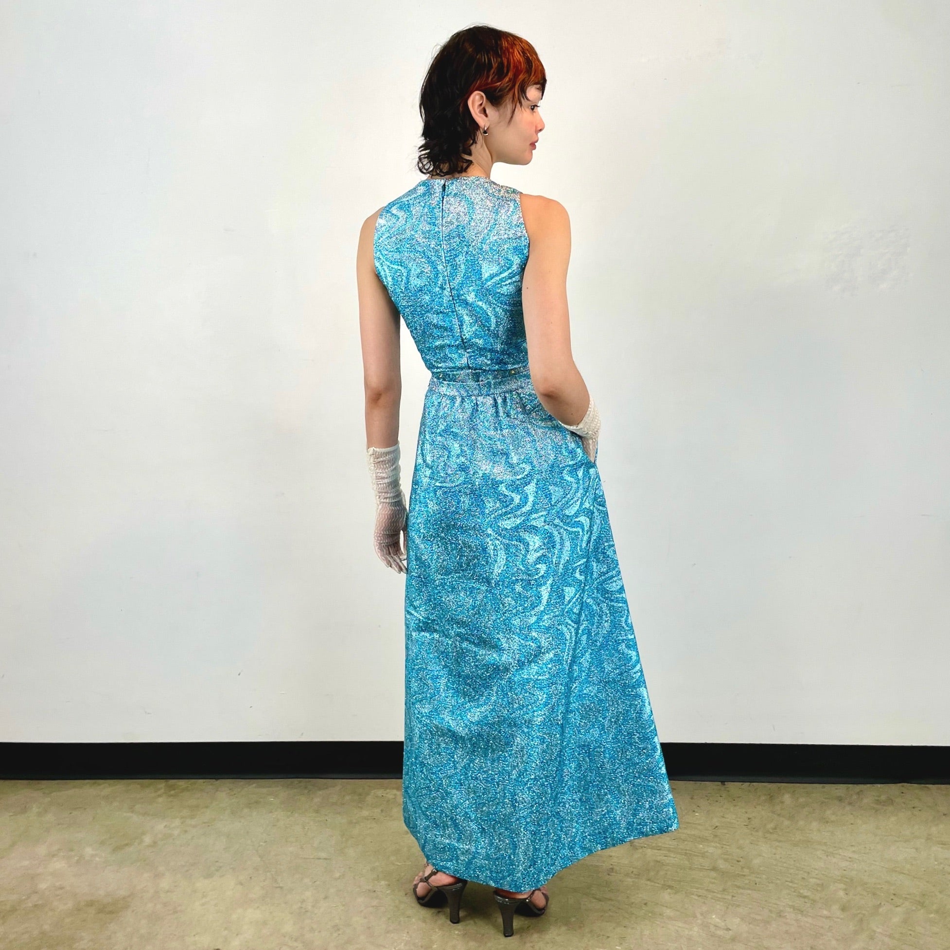 Boheme Vintage 1960s handmade turquoise floral Lurex maxi dress set with fitted sleeveless bodice and flared satin‑lined skirt.