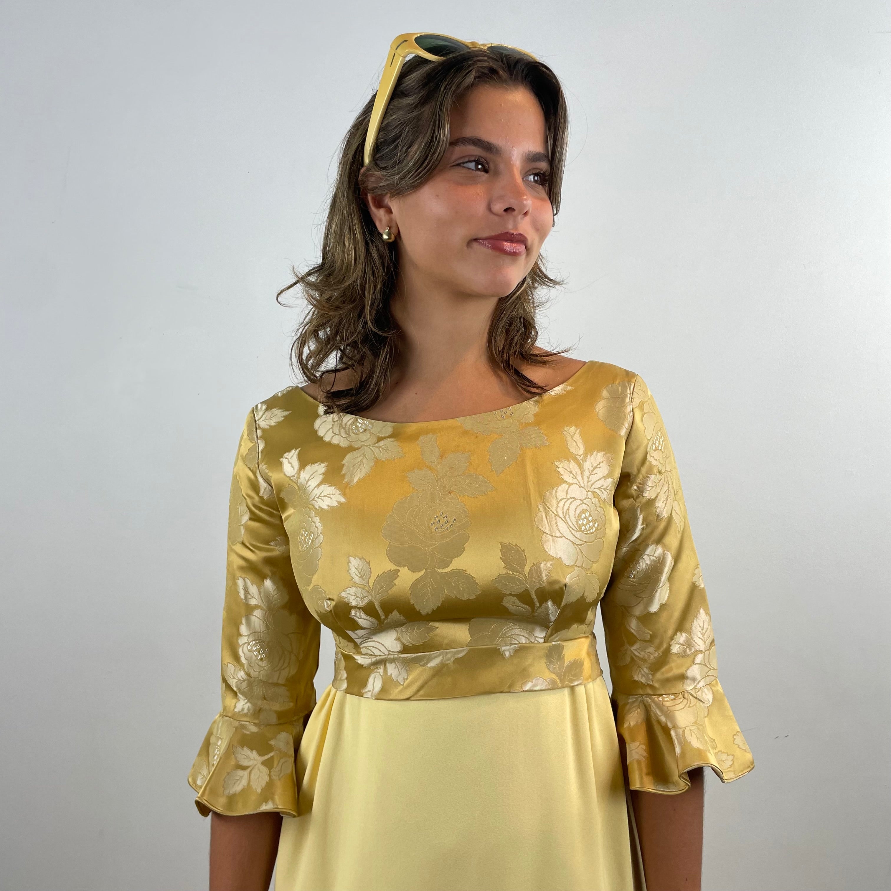 Boheme Vintage 1960s gold brocade and yellow crepe empire waist gown with flounce sleeves and flowing skirt.