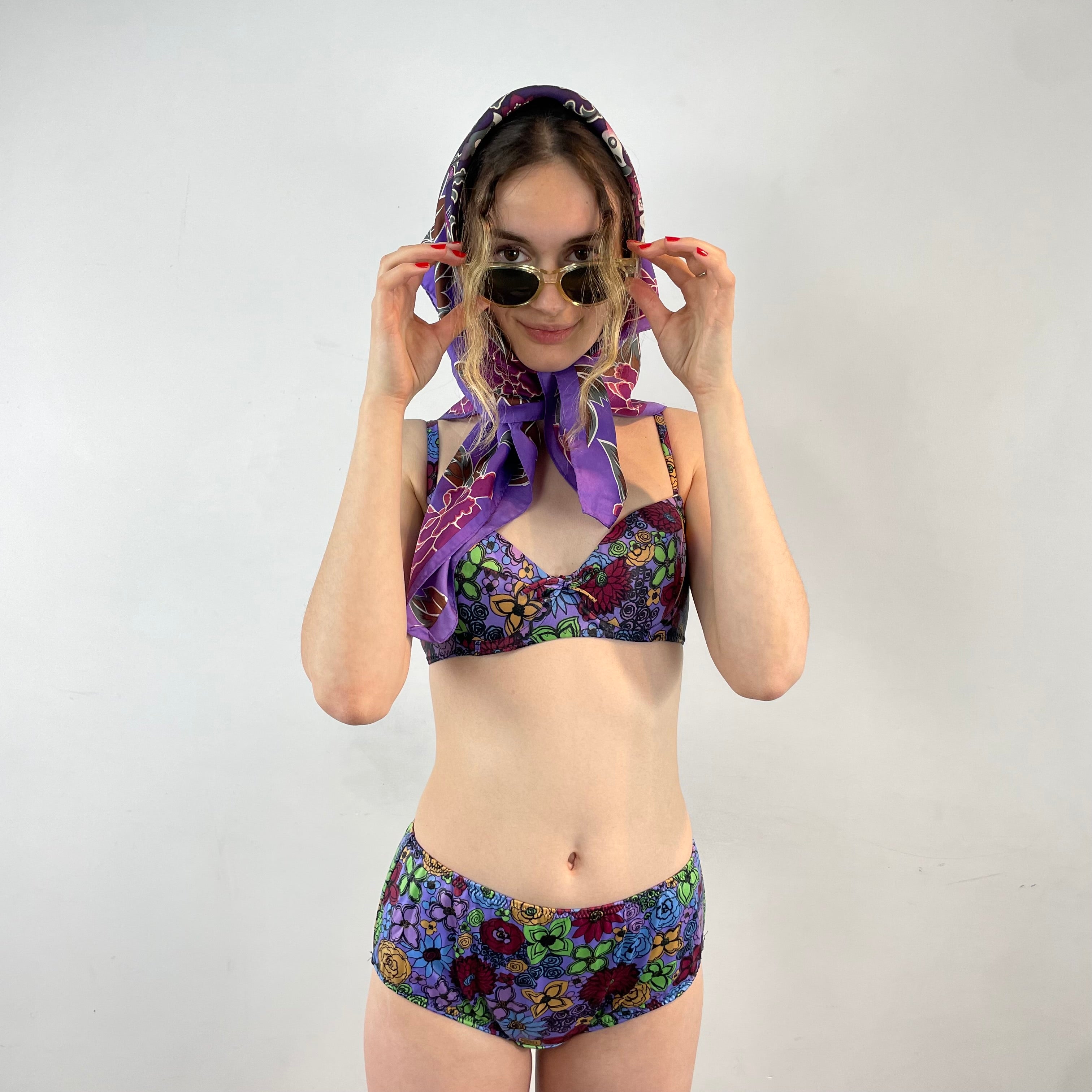Boheme Vintage 1960s Smart Brassière floral two-piece swimsuit with underwire top, adjustable straps, and mid-rise bottoms.