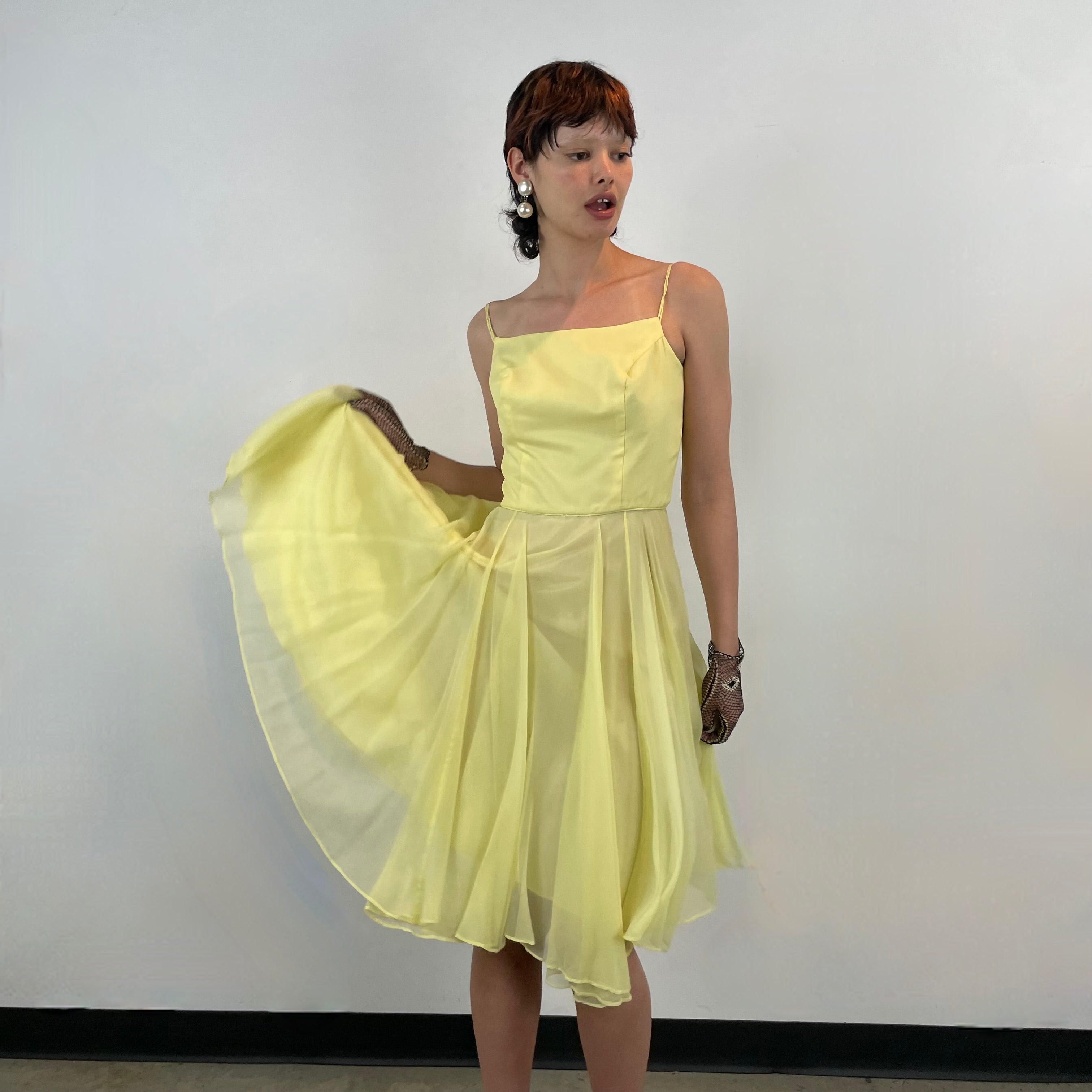 1960s Yellow Chiffon Cocktail Dress 
size Small
sold at bohemevintage.com 
Montréal