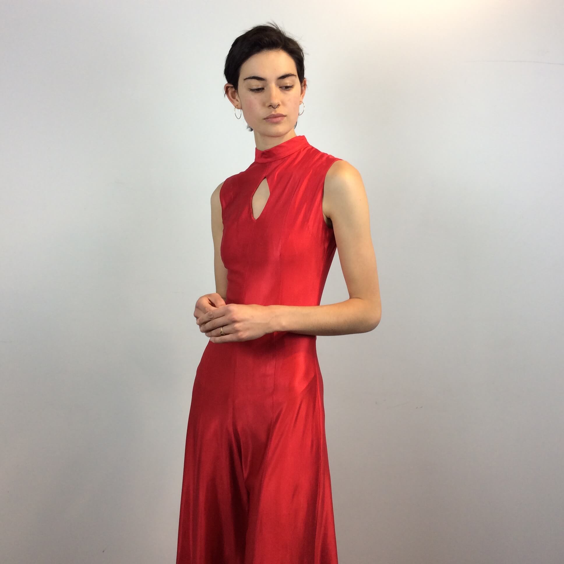 Close up view of 1970s Red Wide Leg Jumpsuit size Small sold at bohemevintage.com Montreal