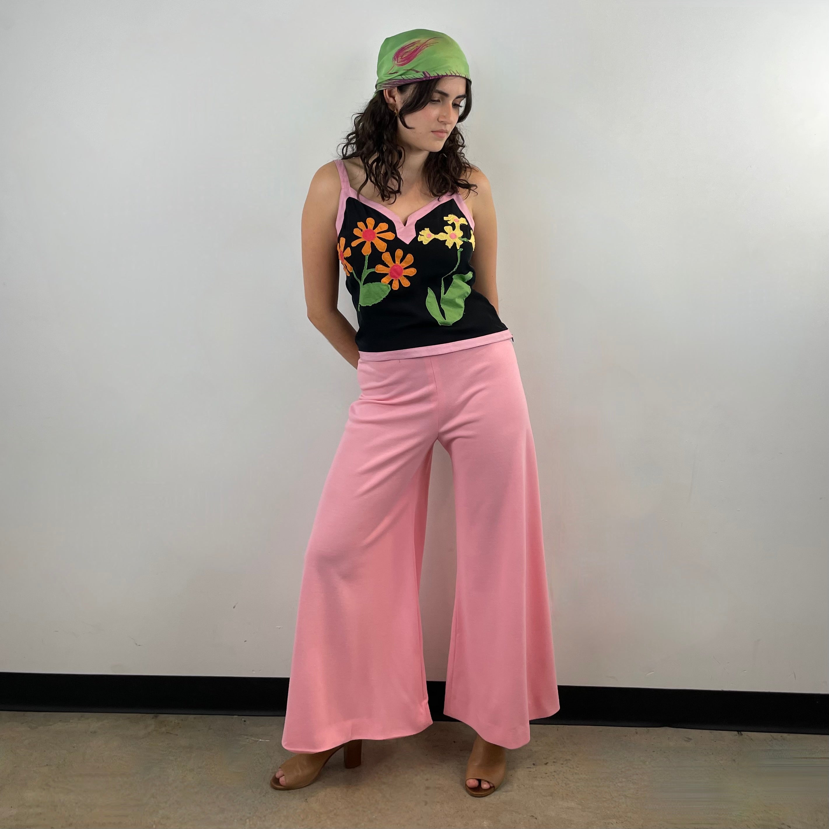 1970s handmade pink high-waisted wide leg jersey pants. Comfortable, flattering, and perfect for festivals, parties, and standout vintage style.