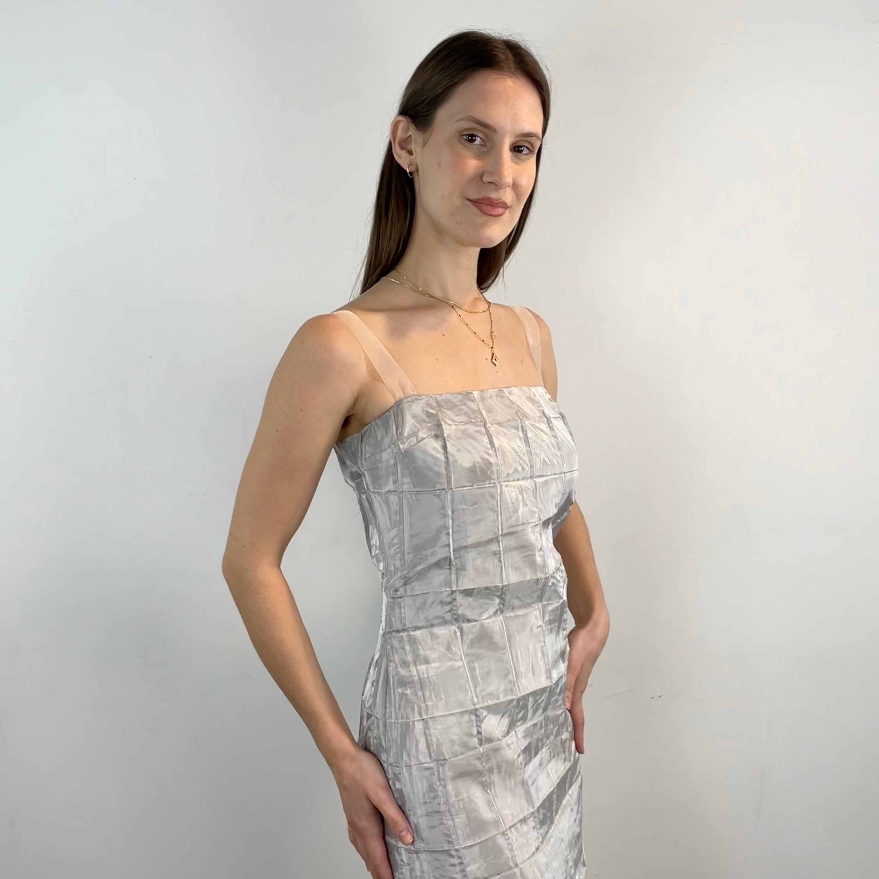 Front/side view of 1990s- 2000s Silver Sleeveless Maxi Sheath Dress Small sold on bohemevintage.com Montreal