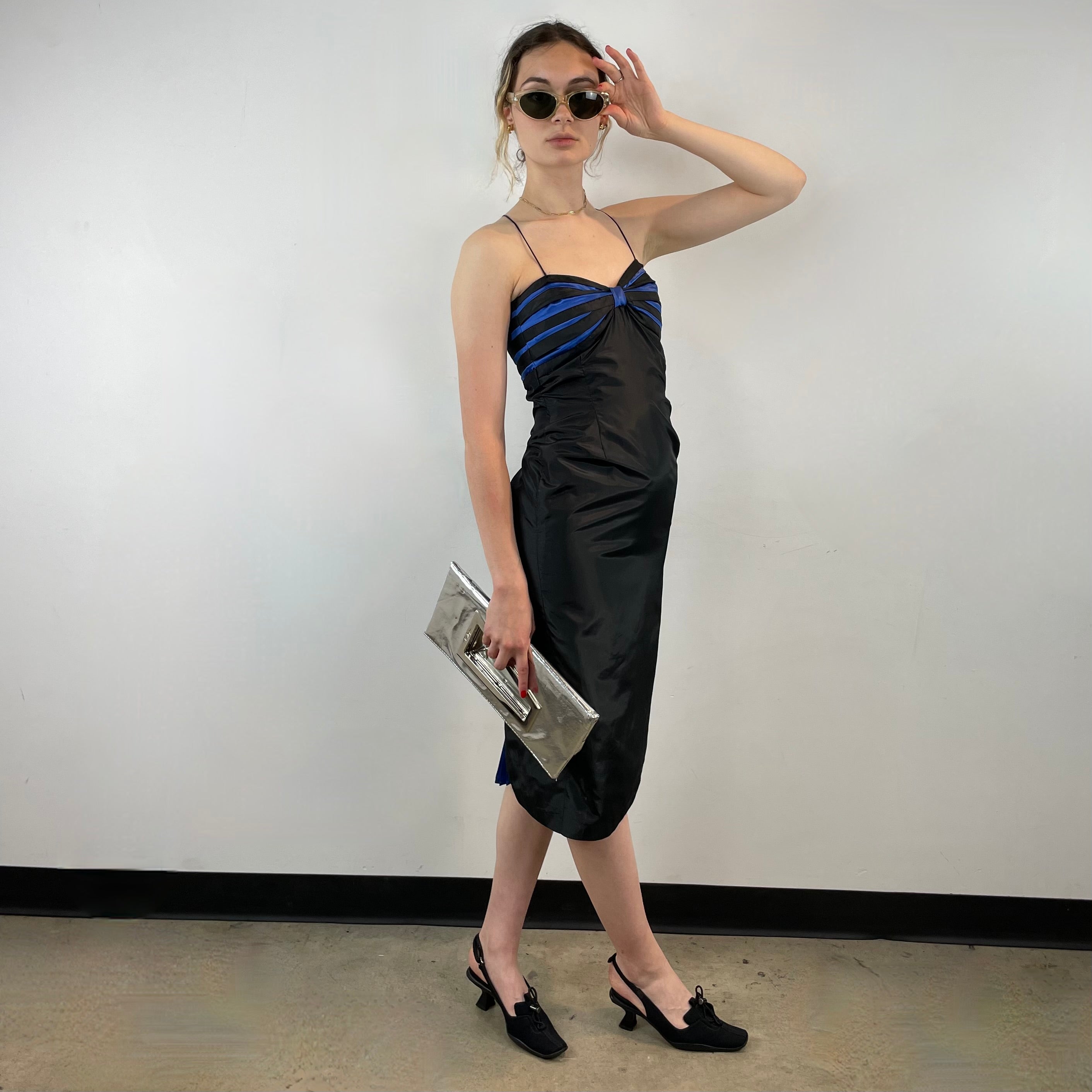 Boheme Vintage 1990s–2000s black satin bustier pencil dress with blue pleated detailing, spaghetti straps, and fitted silhouette.
