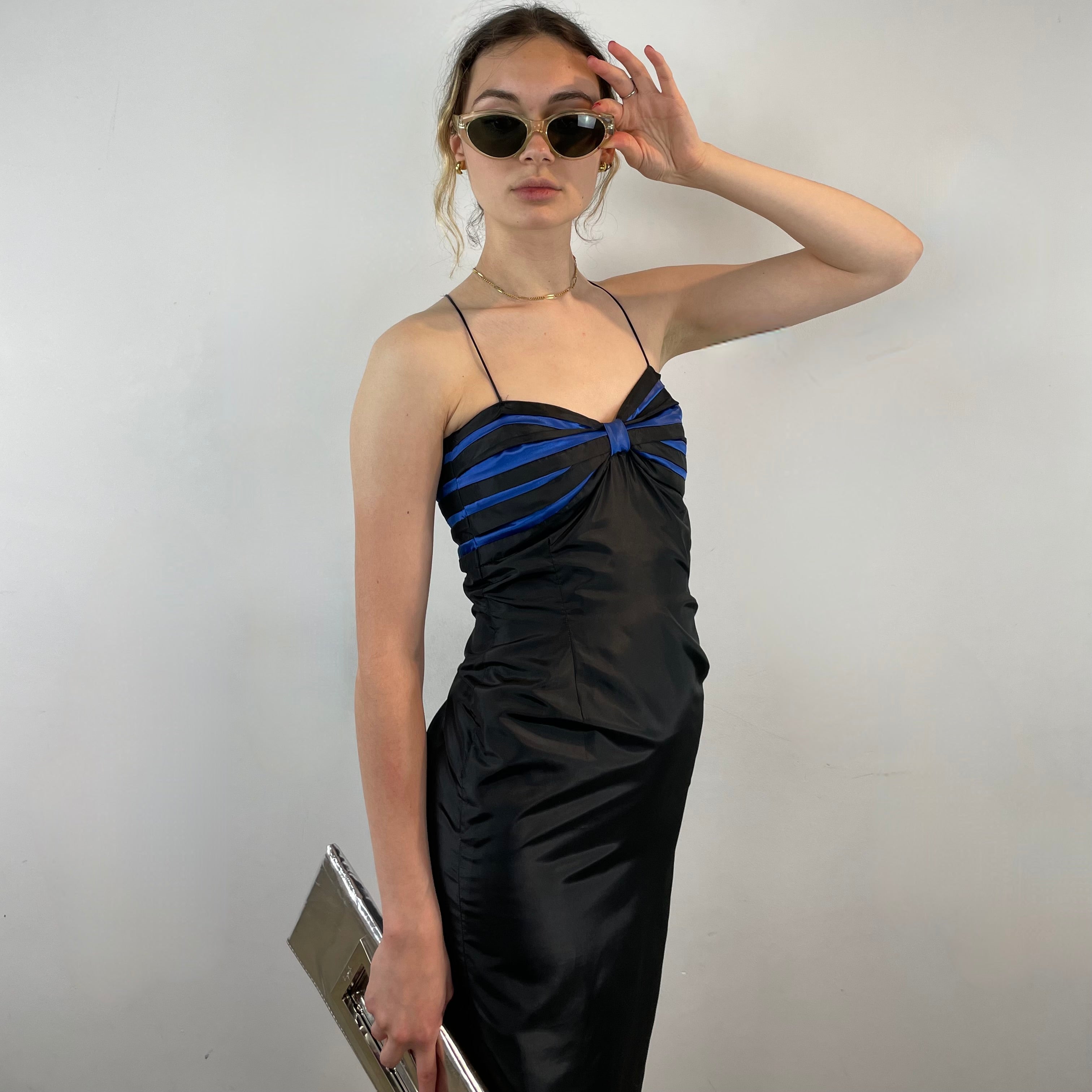 Boheme Vintage 1990s–2000s black satin bustier pencil dress with blue pleated detailing, spaghetti straps, and fitted silhouette.
