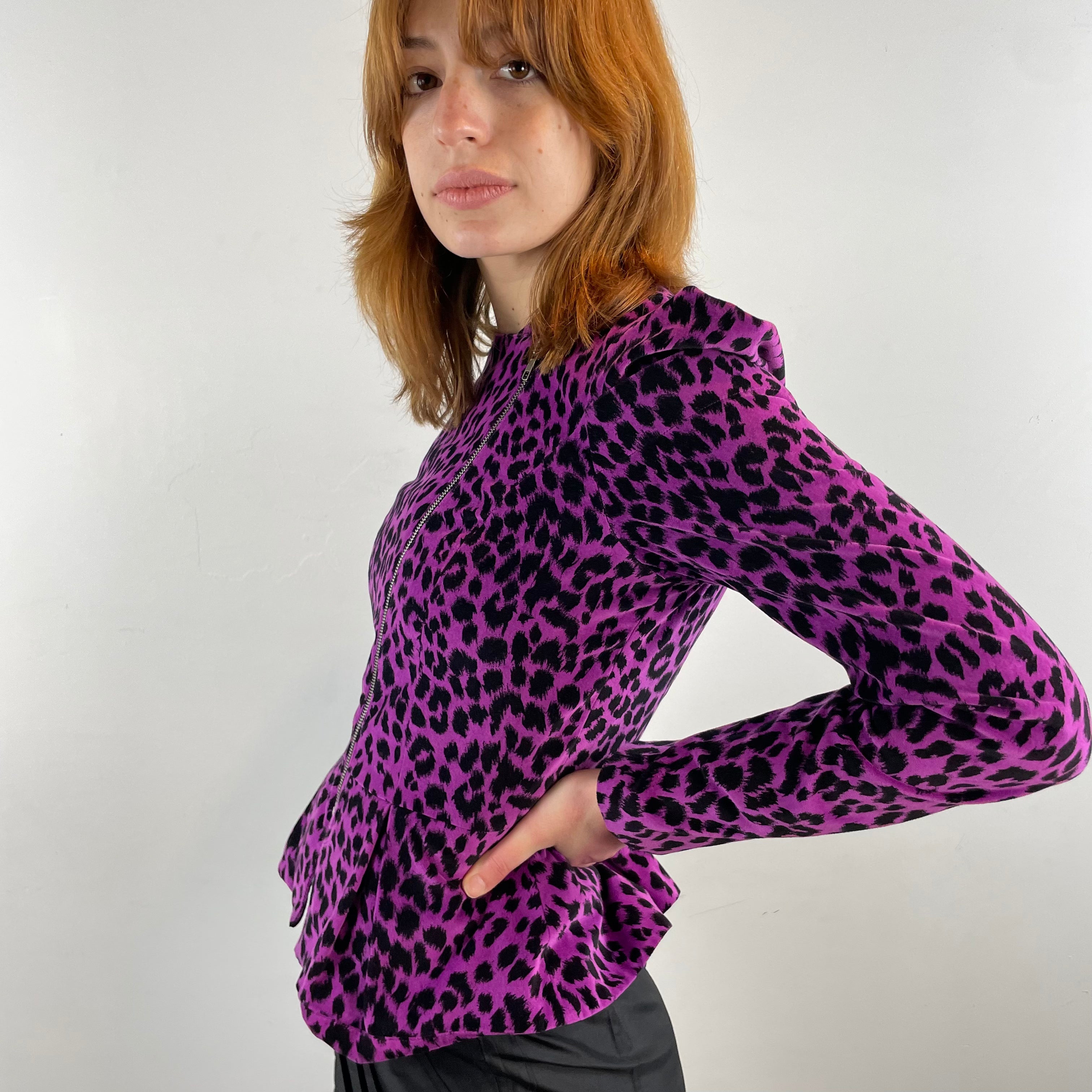 Boheme Vintage 1990s Betsey Johnson velvet leopard print peplum blazer with asymmetrical zipper and structured silhouette.