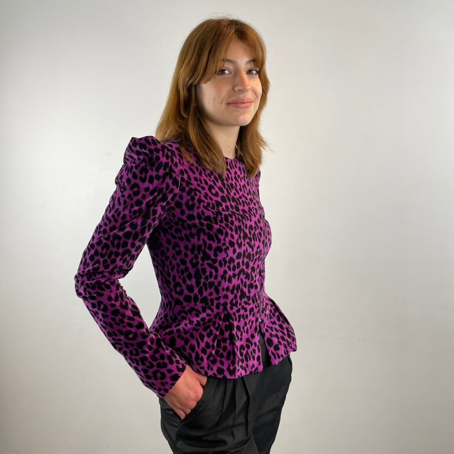 Boheme Vintage 1990s Betsey Johnson velvet leopard print peplum blazer with asymmetrical zipper and structured silhouette.
