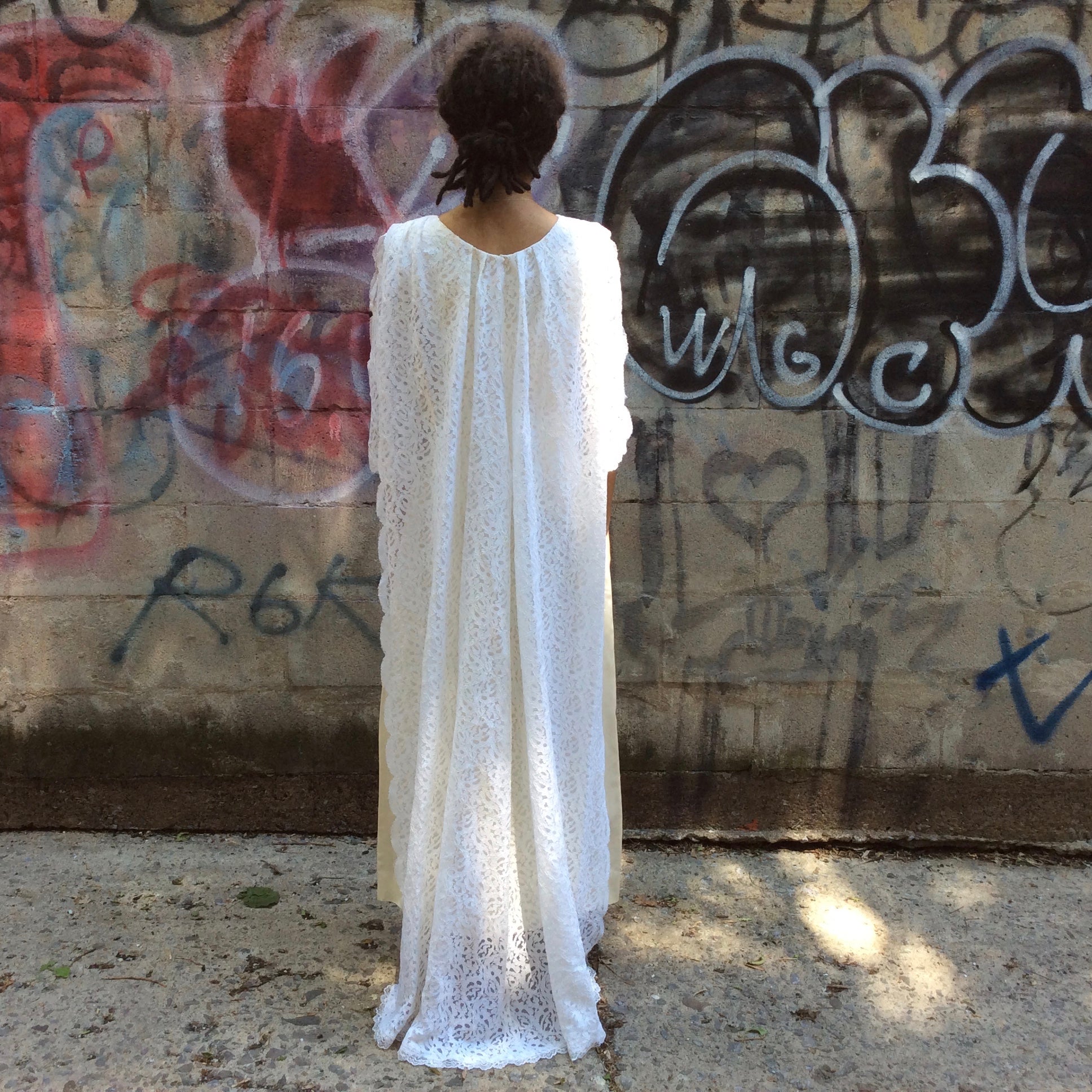 back view of 1960s-1970s Ivory Wedding Gown with Train
Size extra small
sold at bohemevintage.com, Montréal