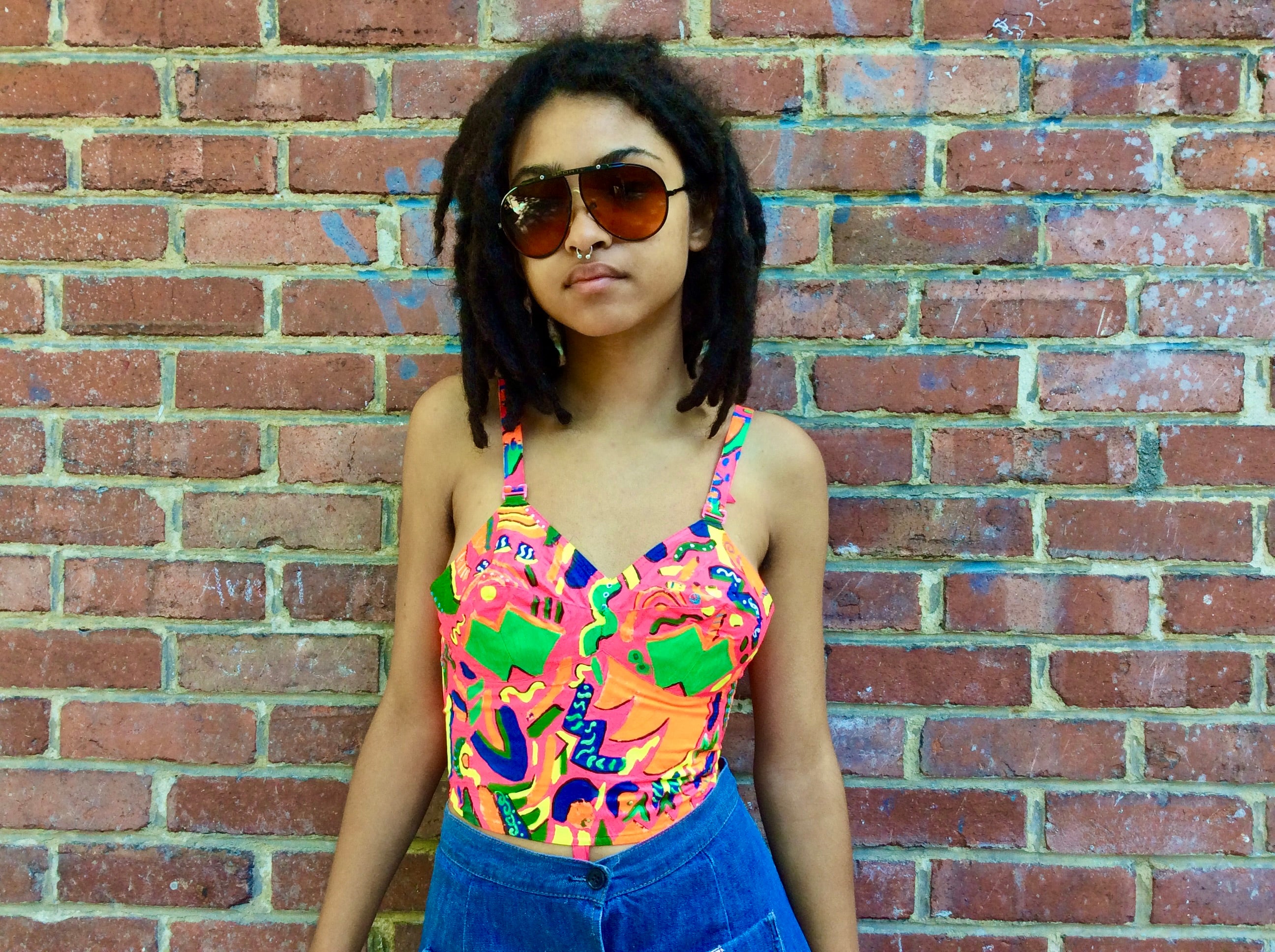 Front view of 1960s Upcycled Hand Painted Bustier Top 
size Small, sold at bohemevintage.com
Montréal