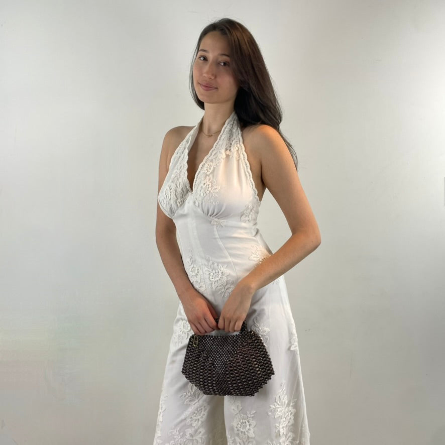 1970s White Embroidered Wide-Leg Jumpsuit 
Size Small/Medium
Sold at bohemevintage.com
Montréal