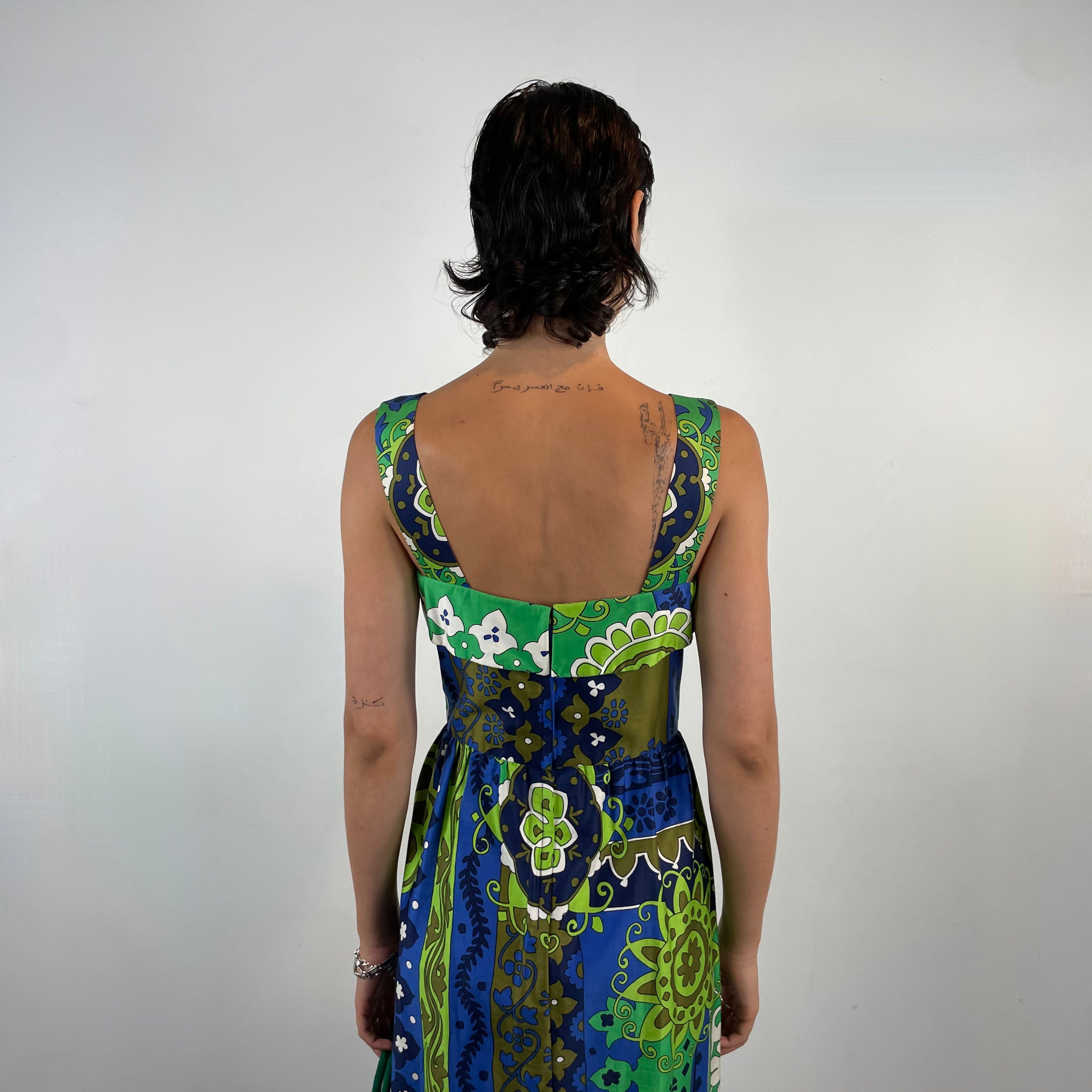 Back view of 1970s Bold Foulard Print Maxi Cotton Dress
Size Small
Sold at bohemevintage.com 
Montréal 