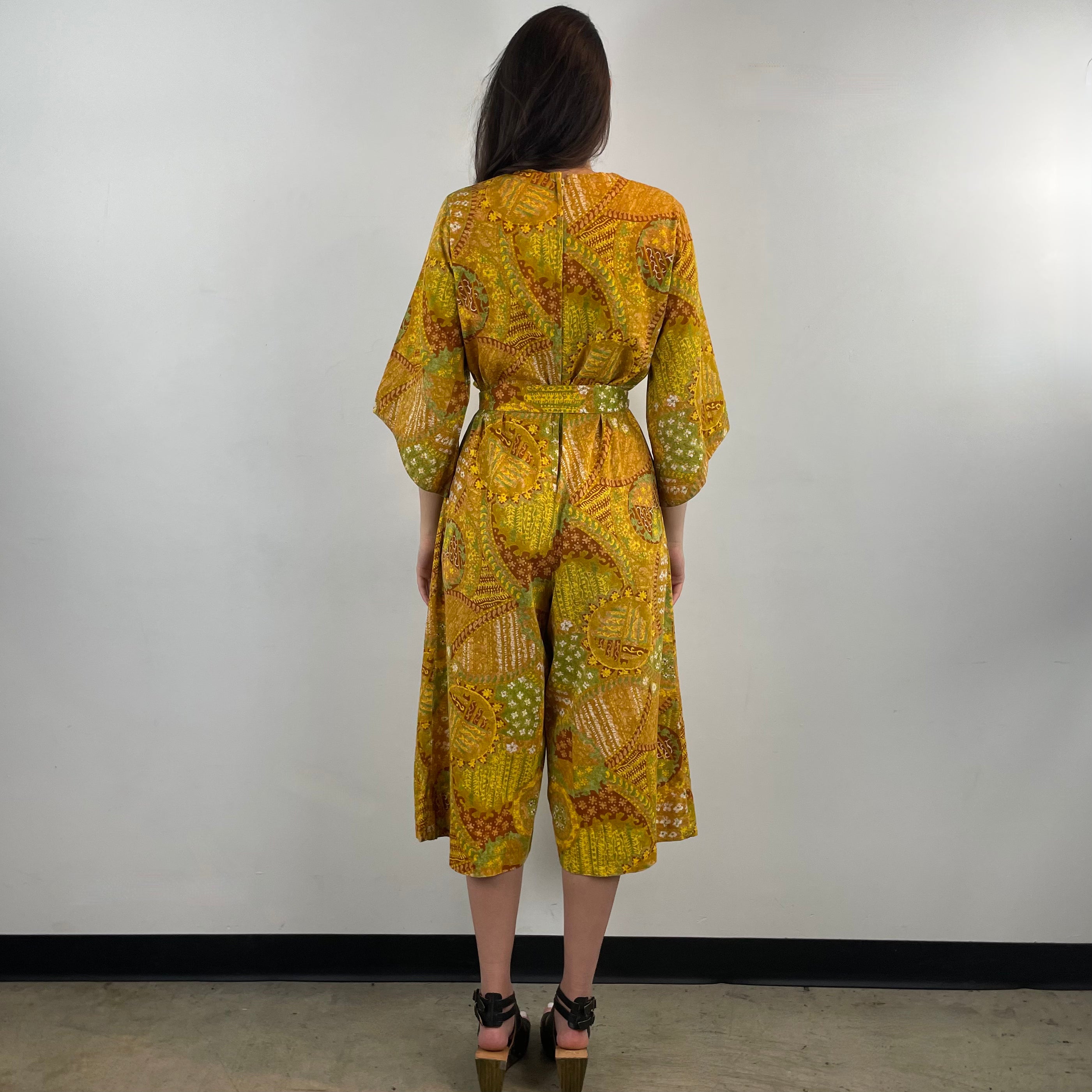 Back view of 1970s Bold Print Cropped Jumpsuit 
One Size
Sold at bohemevintage.com, Montréal