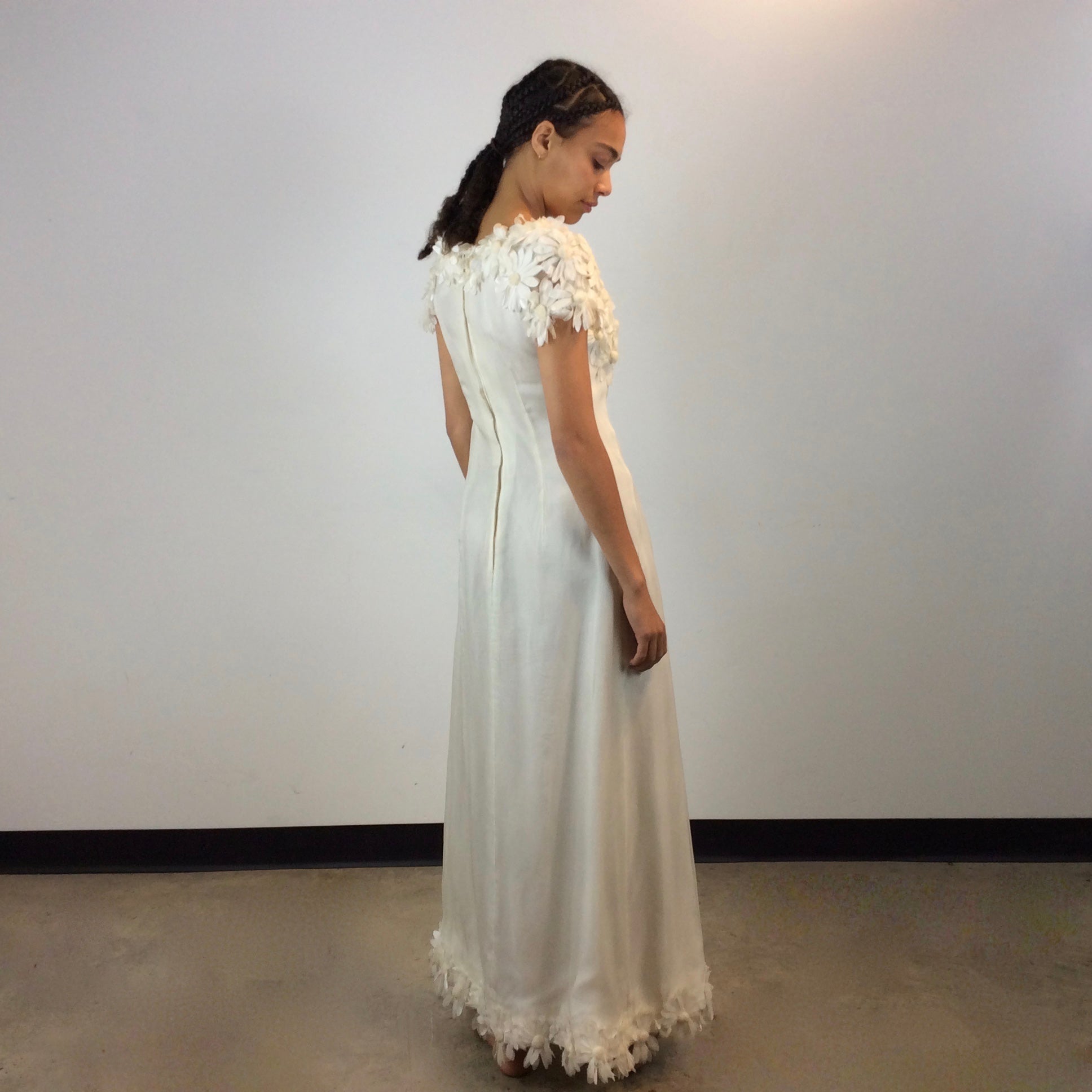 Back view of 1970s Daisy Embellished Ivory Organza Maxi Dress 
Size Small
Sold at bohemevintage.com
Montréal