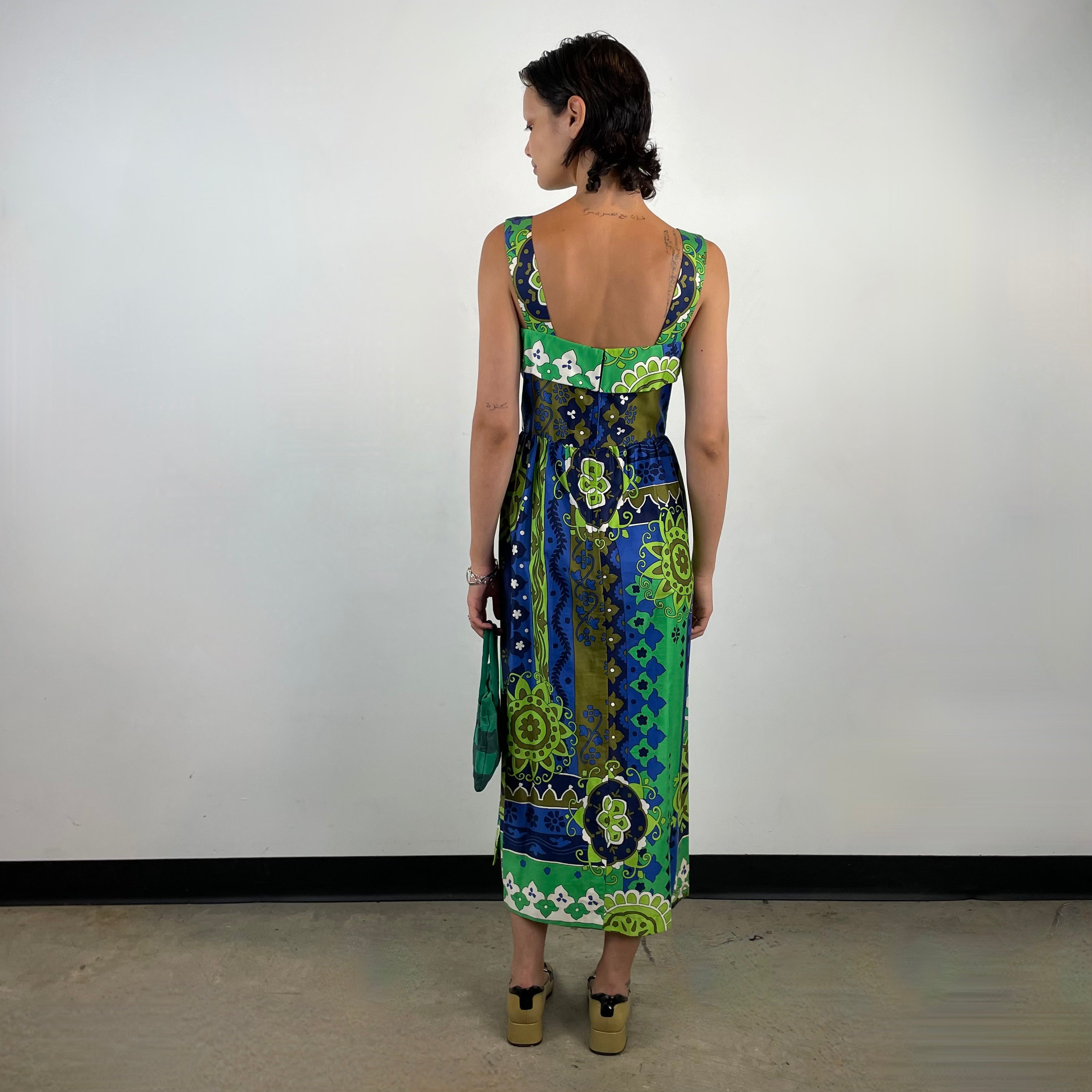 Back view of 1970s Bold Foulard Print Maxi Cotton Dress
Size Small
Sold at bohemevintage.com 
Montréal 